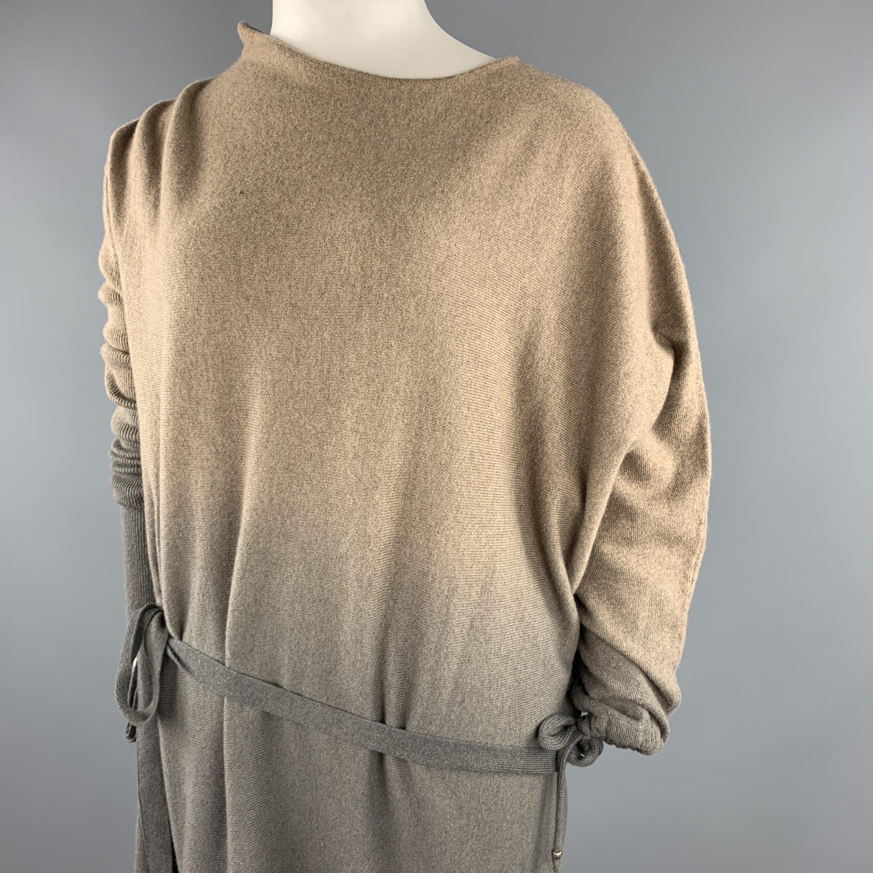 HENRY BEGUELIN sweater dress comes in tape cashmere knit with an all over ombre effect , asymmetrical design, tied drawstring cuff and belt. Made in Italy.Very Good
Pre-Owned Condition. 

Marked:   (no size) 

Measurements: 
 
Shoulder: 20 inches