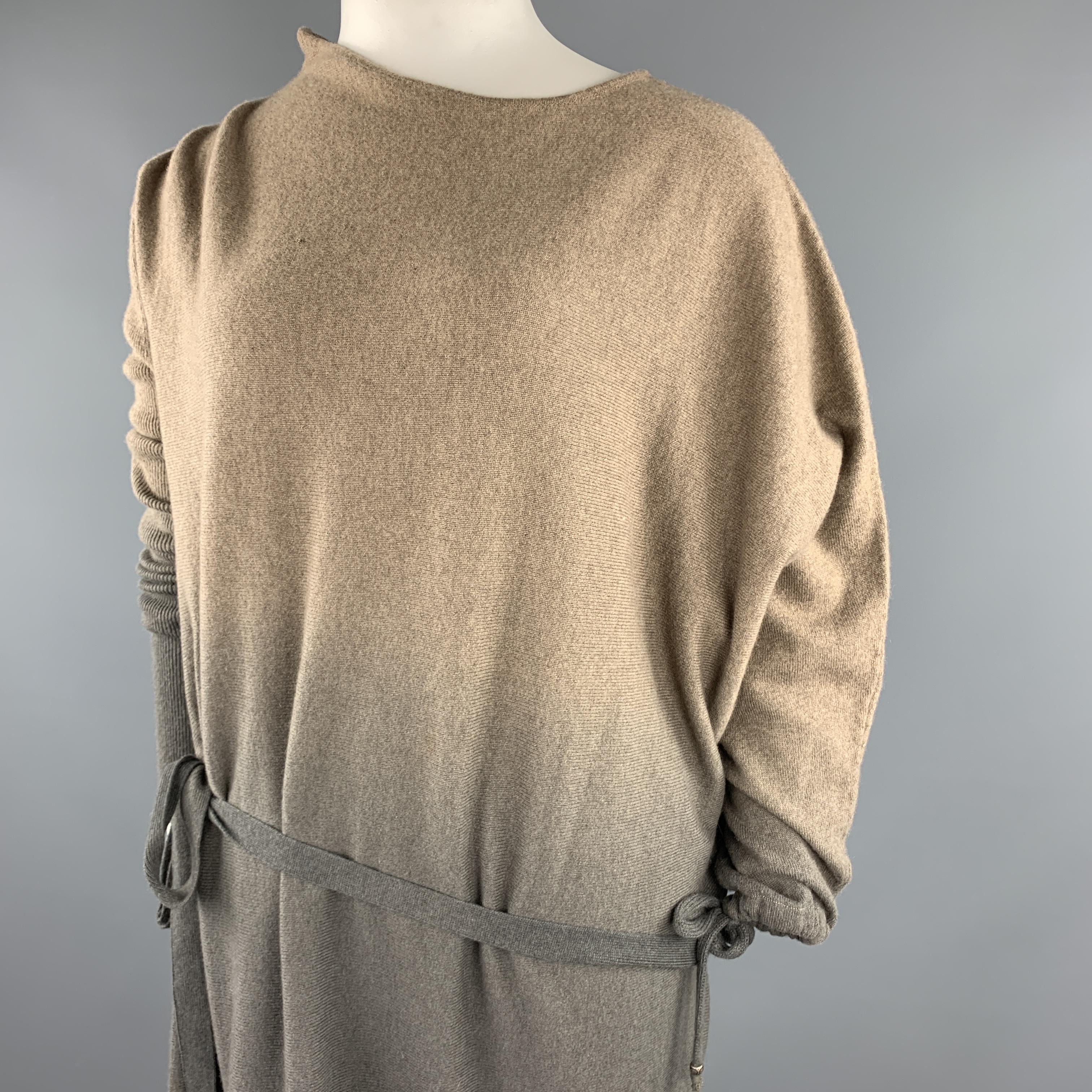 HENRY BEGUELIN sweater dress comes in tape cashmere knit with an all over ombre effect , asymmetrical design, tied drawstring cuff and belt. Made in Italy.

Very Good Pre-Owned Condition.
Marked: (no size)

Measurements:

Shoulder: 20 in.
Chest: 4