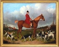19th century English, huntsman on his horse with fox hounds in a landscape