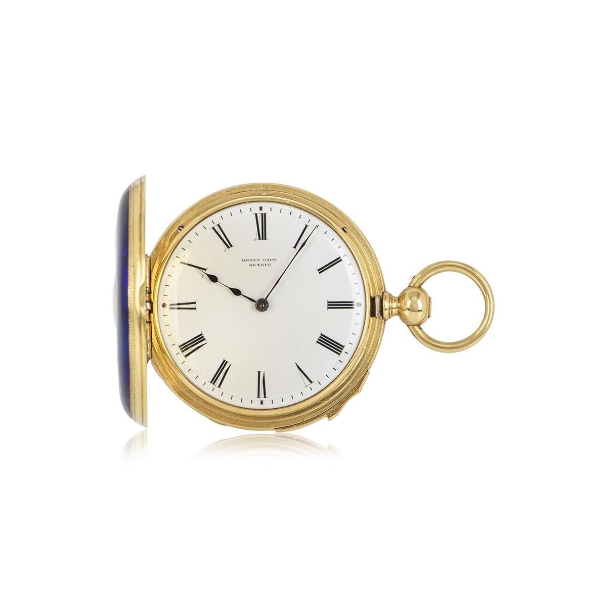 A quarter repeating keywind 35mm enamel half hunter pocket watch. The front and back cover is enamelled in a dark blue starburst guilloche enamel.

The gold coloured Roman numerals and gold coloured inner chemin de fer chapter ring, signed white
