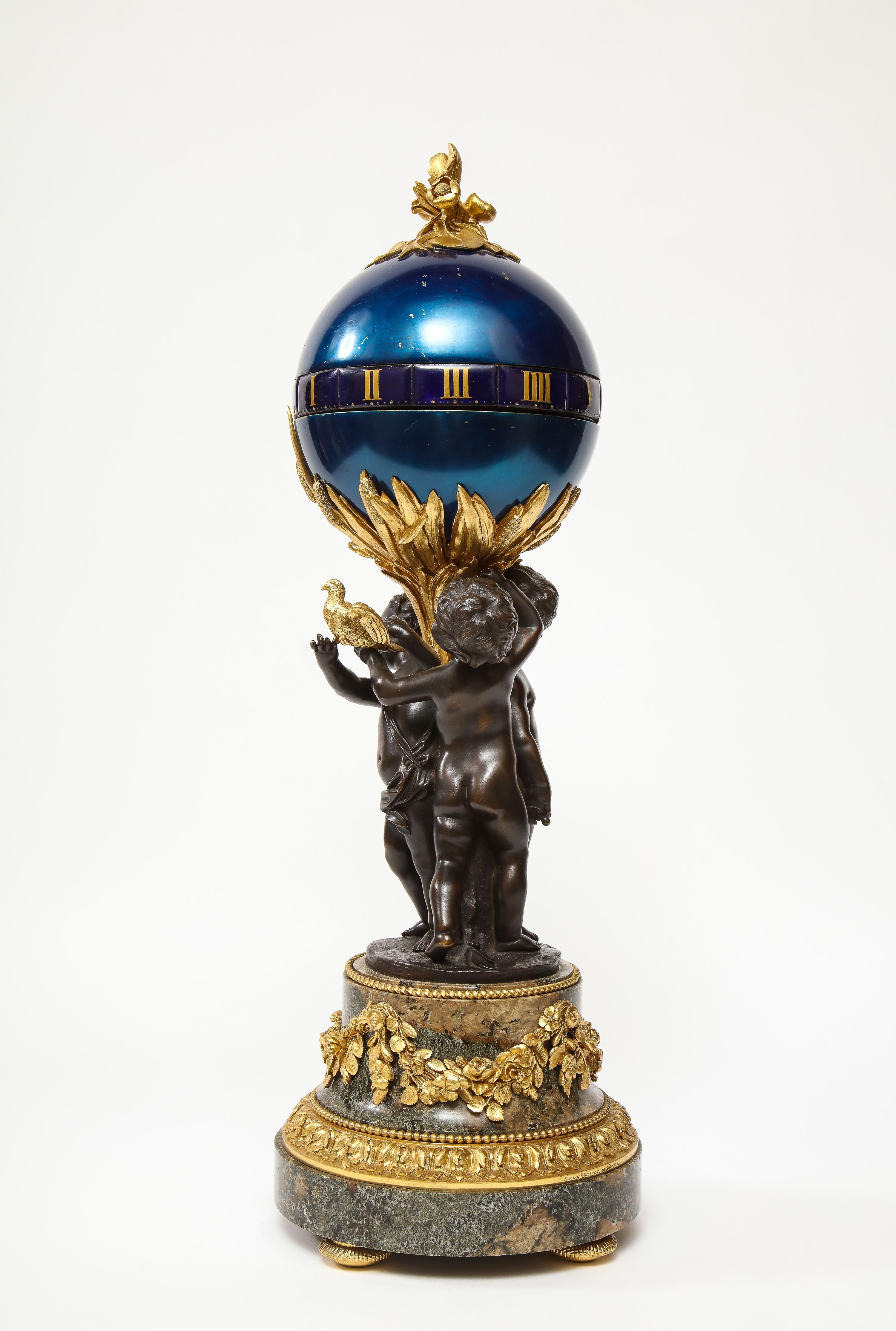 Henry Dasson, a French Gilt and Patinated Bronze Marble and Enamel Annular Clock 8