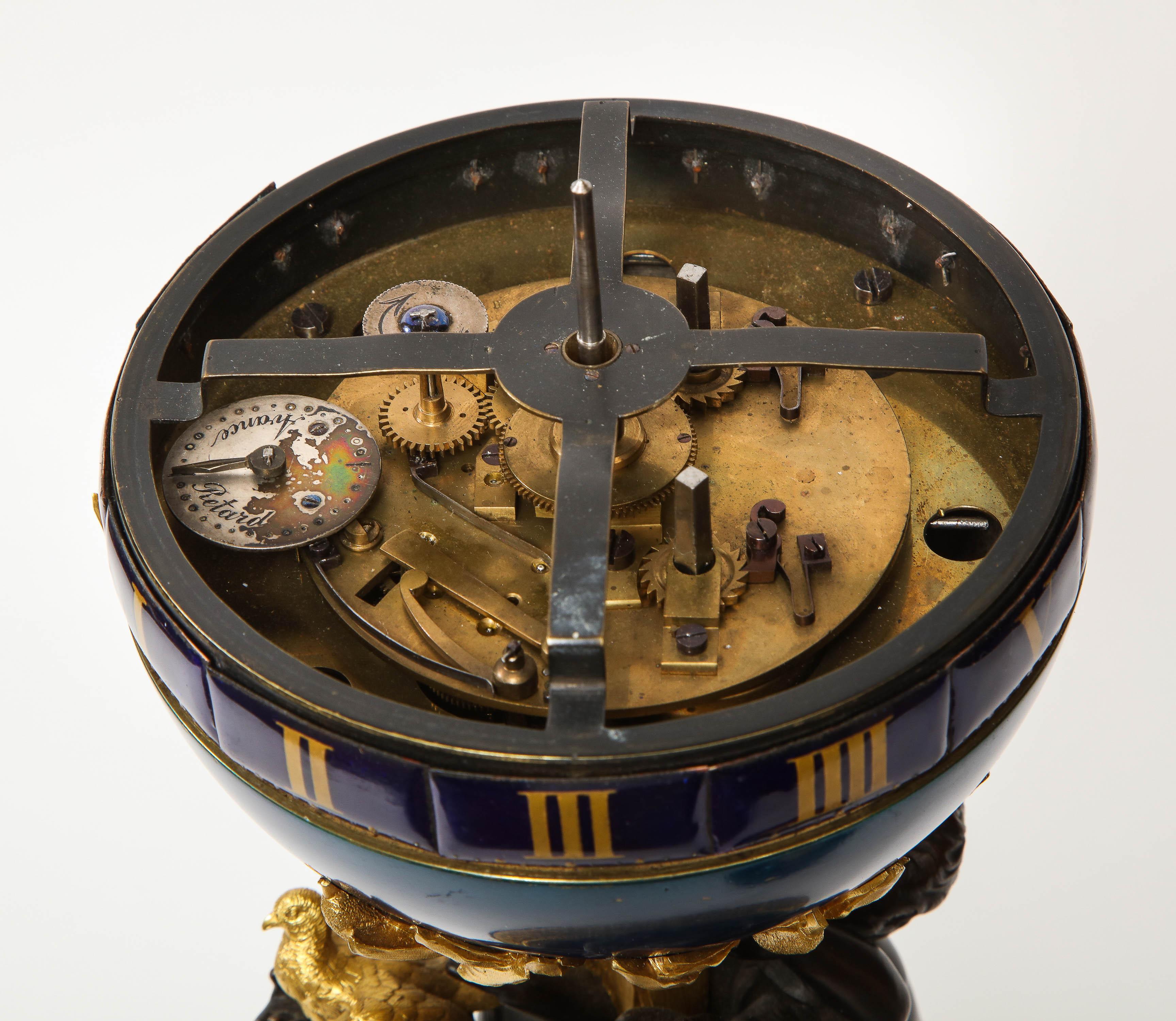 Henry Dasson, a French Gilt and Patinated Bronze Marble and Enamel Annular Clock 10
