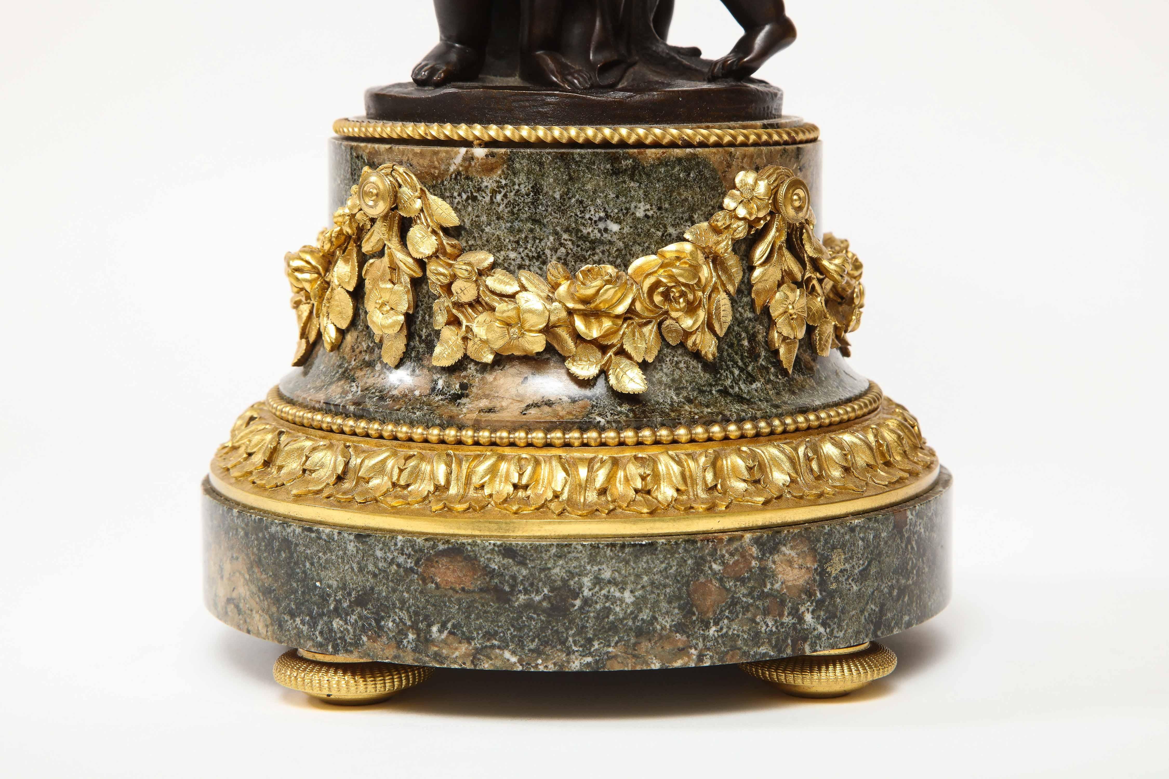 Napoleon III Henry Dasson, a French Gilt and Patinated Bronze Marble and Enamel Annular Clock