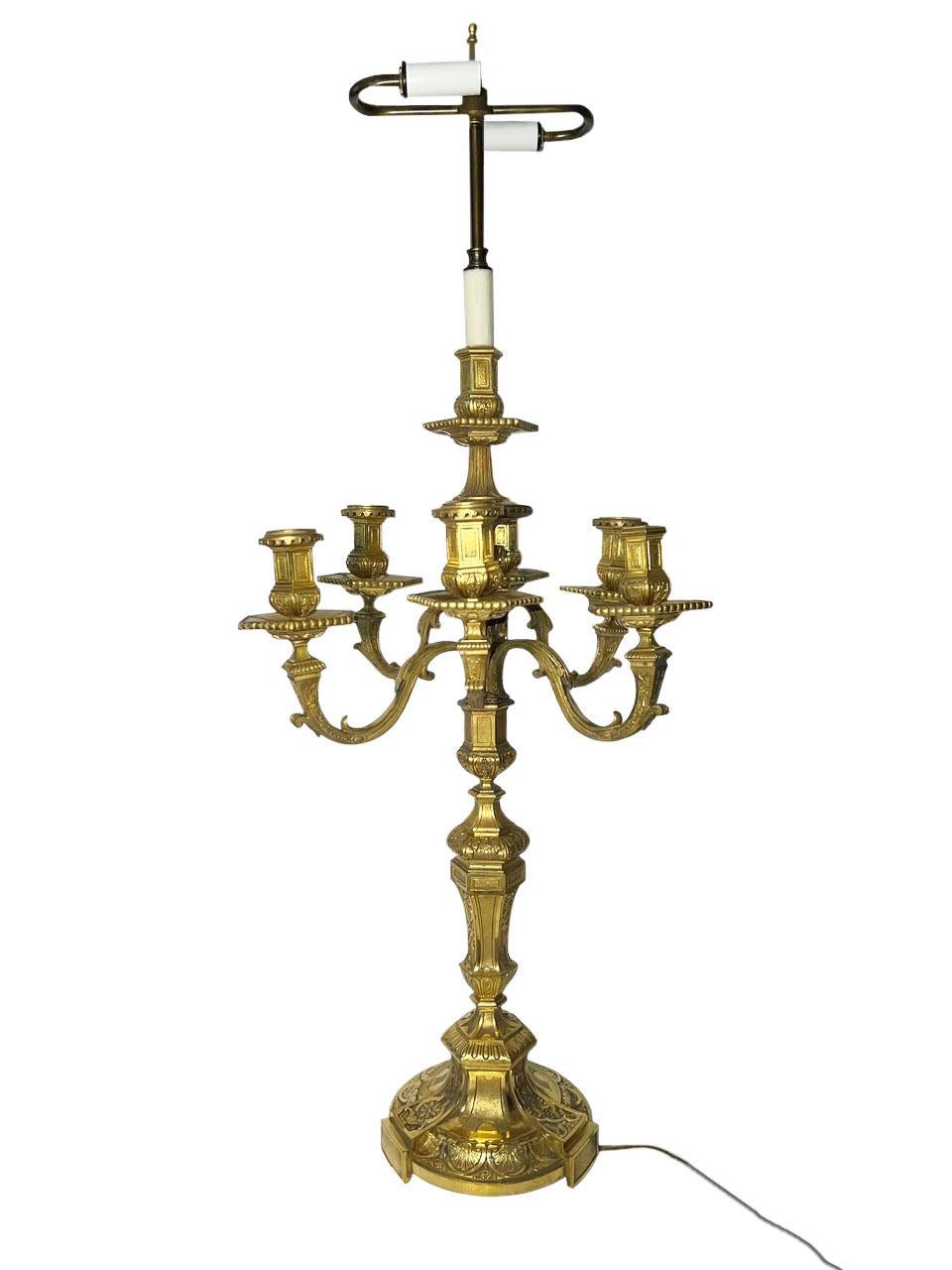 Fabulous pair of incredible six arm Henry Dasson gilt bronze candelabra now as electrified lamps. Original bronze dore gold is in great condition. Henry Dasson is considered one of the finest makers of gilt bronze, with one characteristic of his