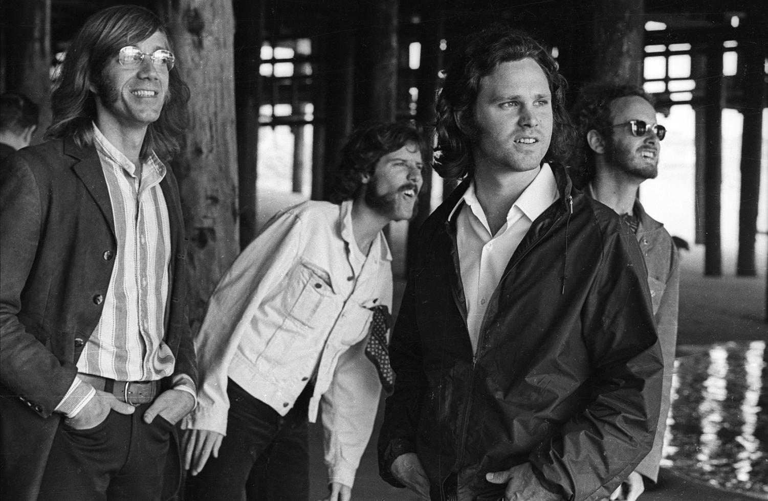 Henry Diltz Black and White Photograph - The Doors, Venice Pier, CA 1969