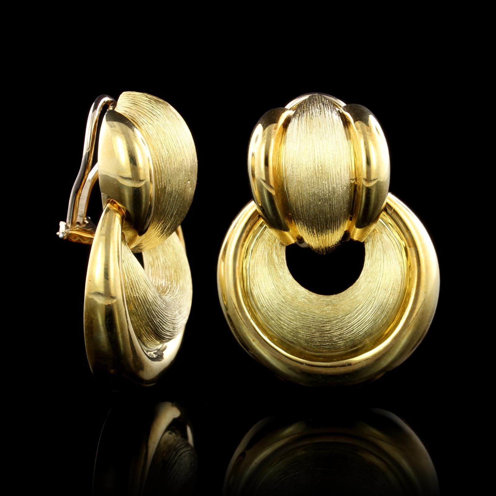 Henry Dunay 18K Yellow Gold Door Knocker Earrings. The earrings are designed with brushed and polished gold, width 1 1/8