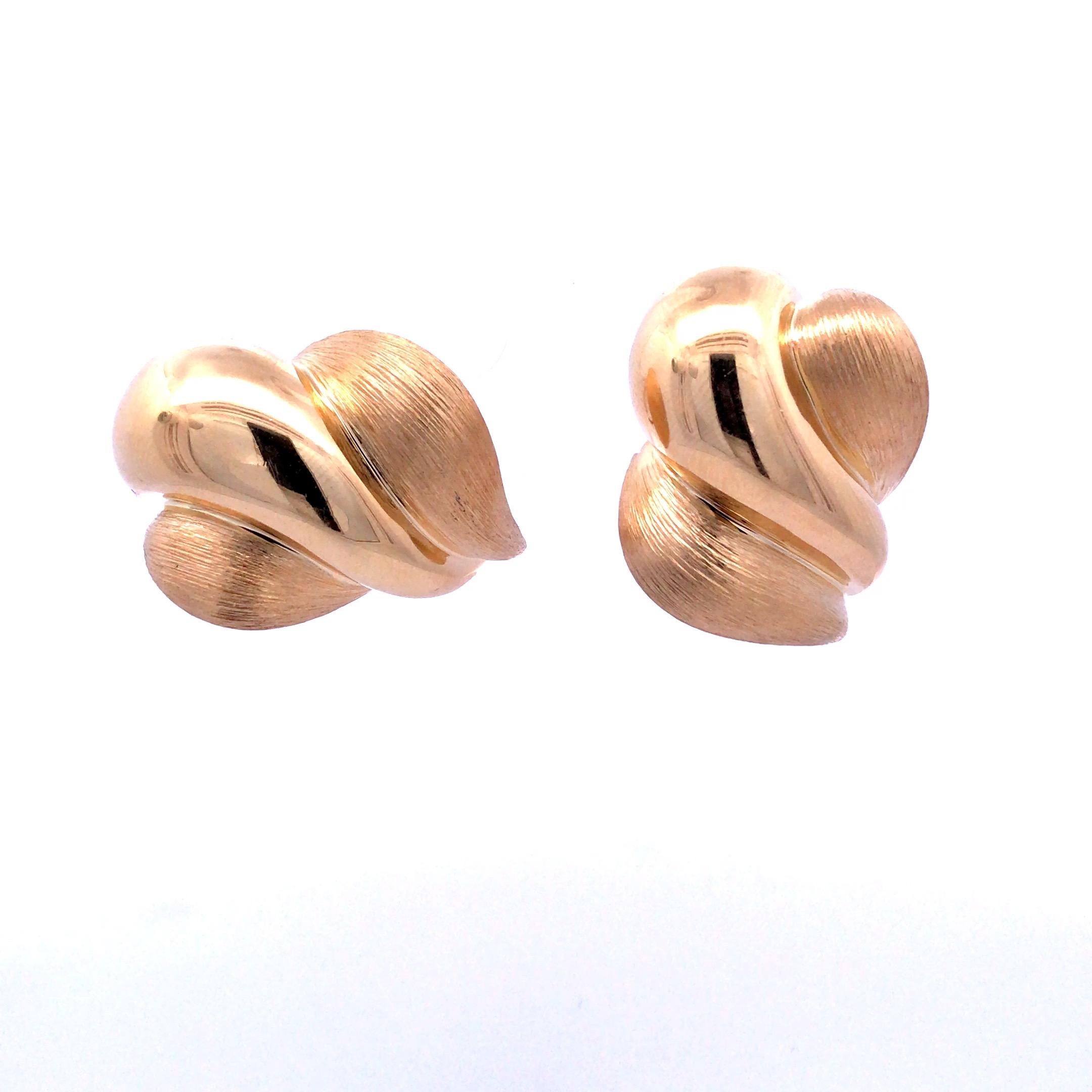 Henry Dunay brushed Sabi finish with high gloss. The earrings have clip backs that can be converted to posts.