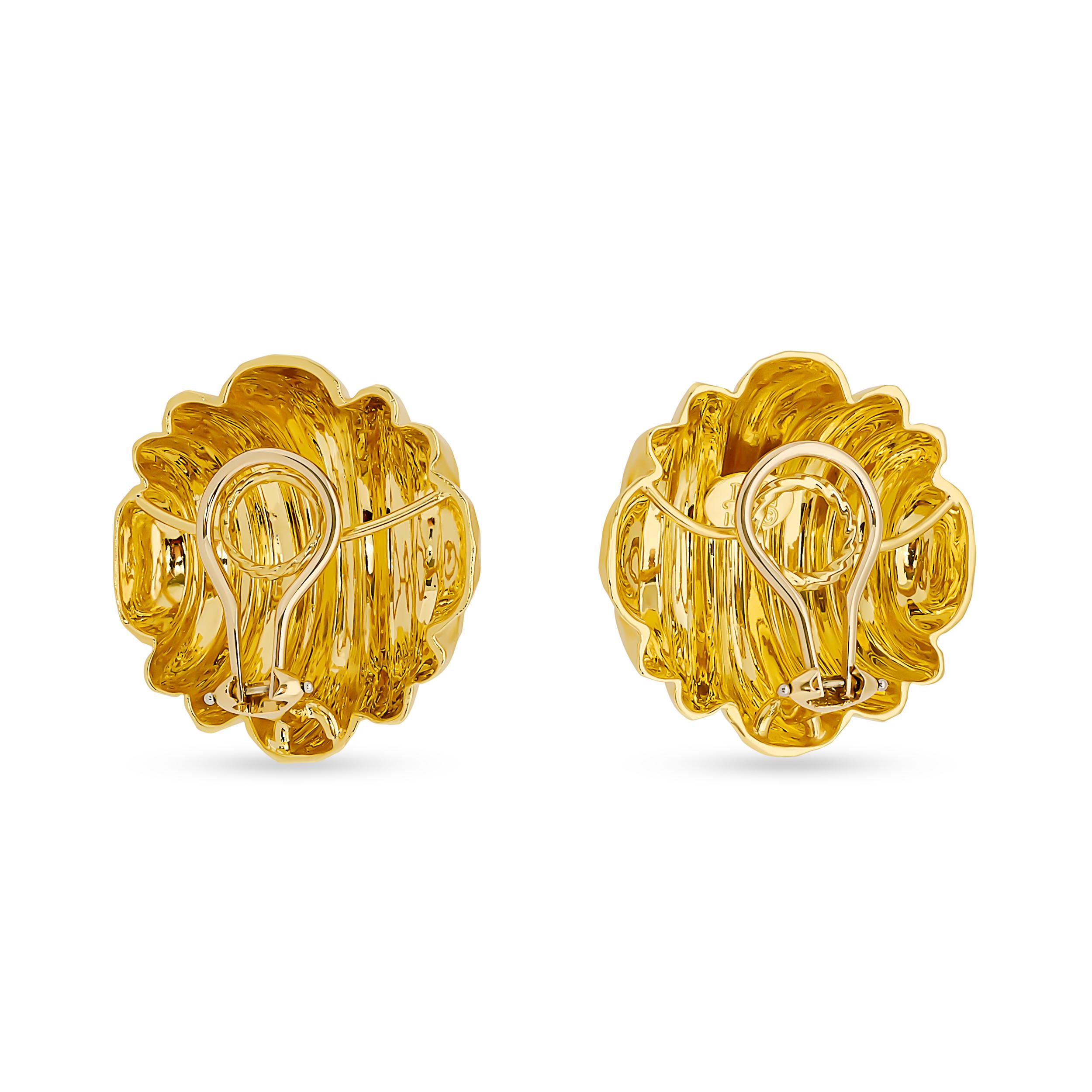 These Henry Dunay 18 karat yellow gold clip-on earrings showcase his signature hammered texture, forming a distinct ridge design that captures light with a sophisticated, textured brilliance.

Stamped: 