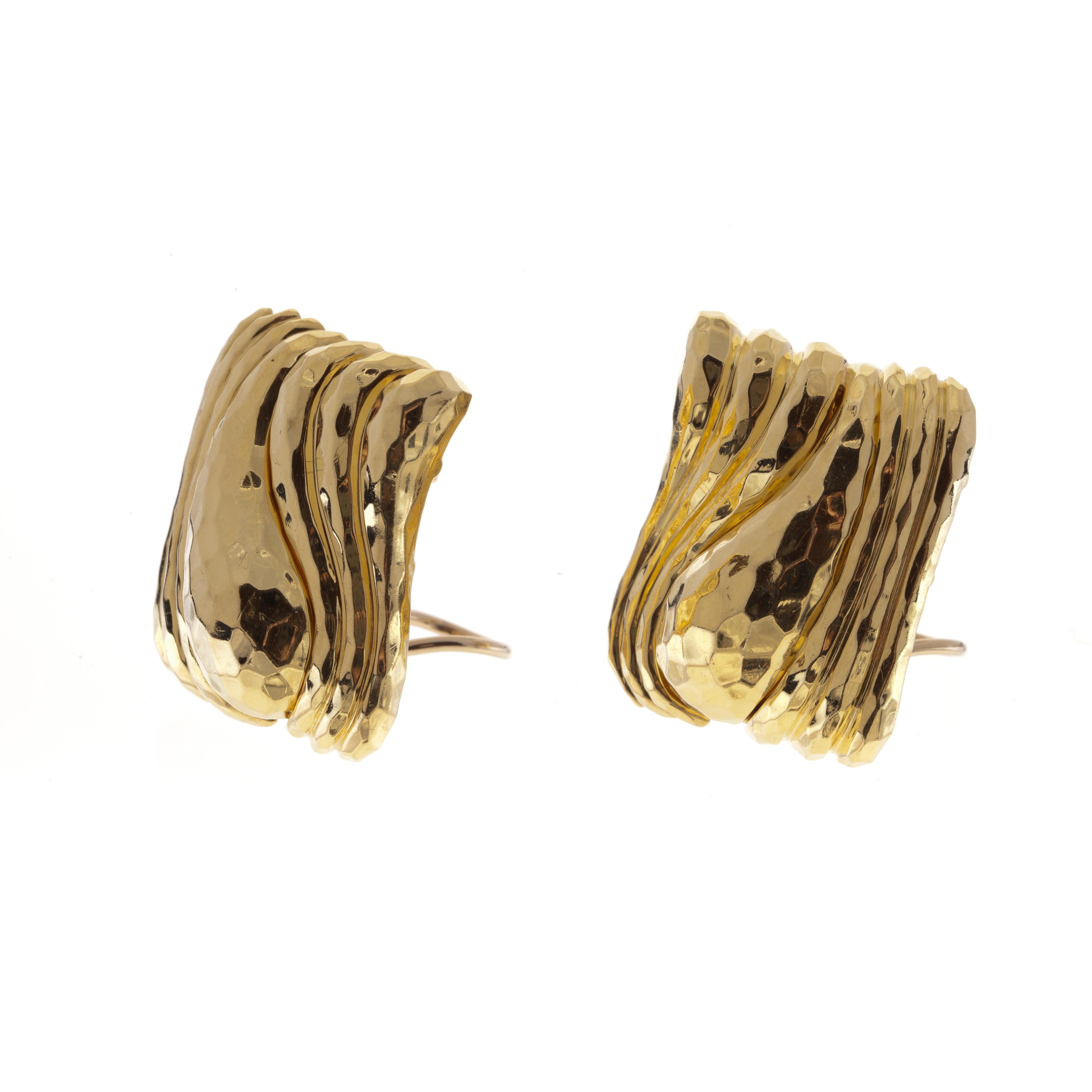 Earrings by Henry Dunay with a hammered finish.  They are very dimensional  with the paisley being raised.  Measure 1-3/16
