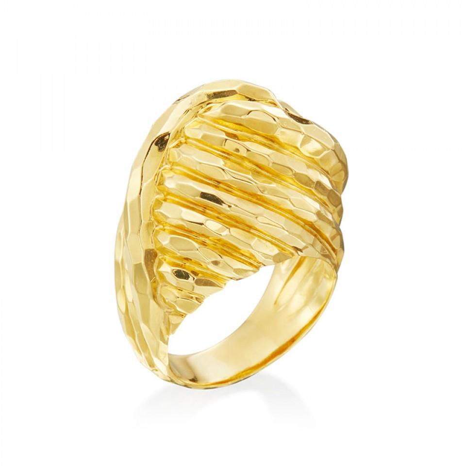From world-renowned jewelry designer Henry Dunay, come this spectacular 18K yellow gold faceted knot ring. Exclusively from our Estate collection, this piece embodies the craftsmanship and integrity of Henry Dunay’s unique aesthetic. The ring is