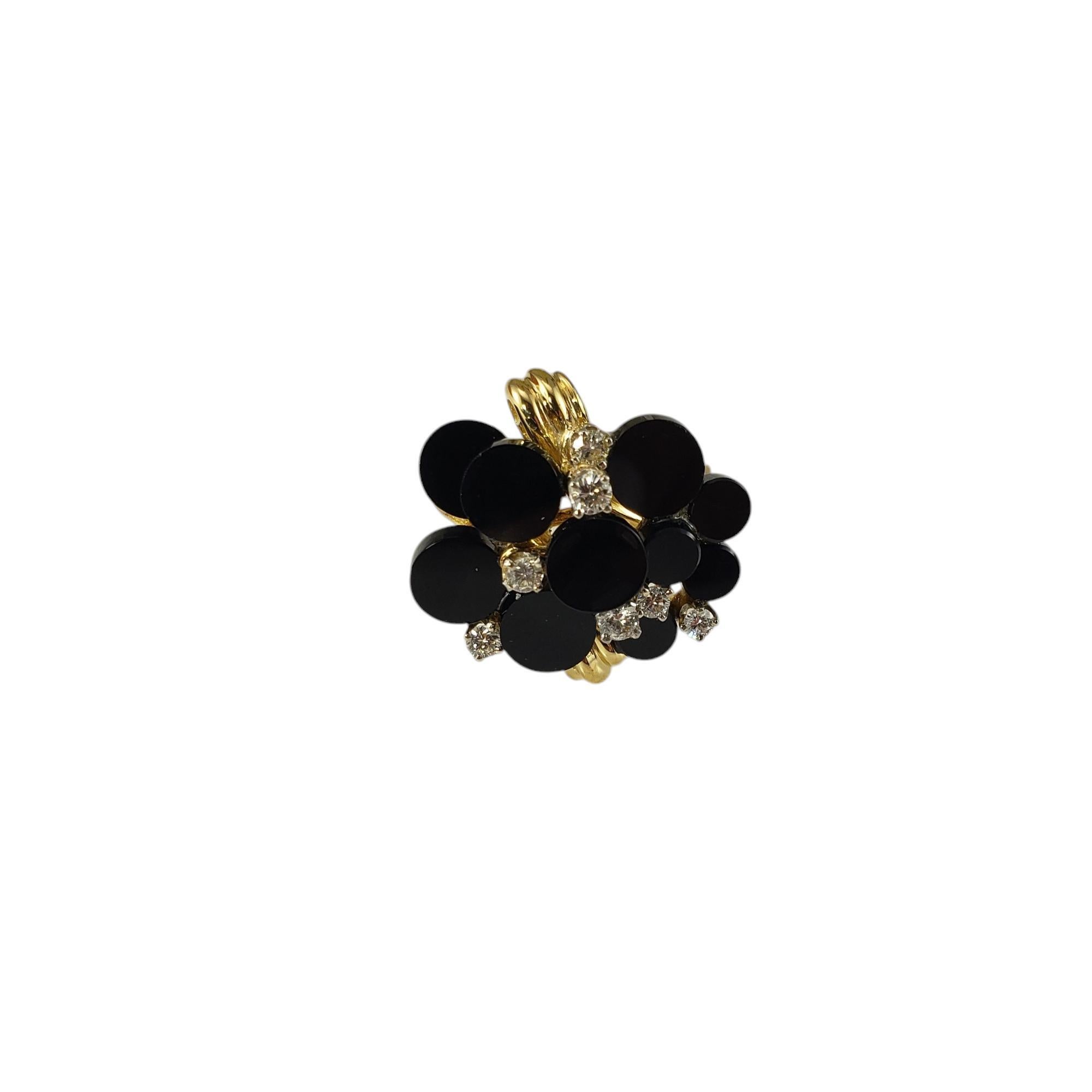 Henry Dunay 18K Yellow Gold Onyx and Diamond Ring Size 7.25

This stunning ring by designer Henry Dunay features 10 polished onyx stones and 10 round brilliant cut diamond set in 18K yellow gold. Width: 21 mm. Shank: 3 mm.

Approximate total diamond