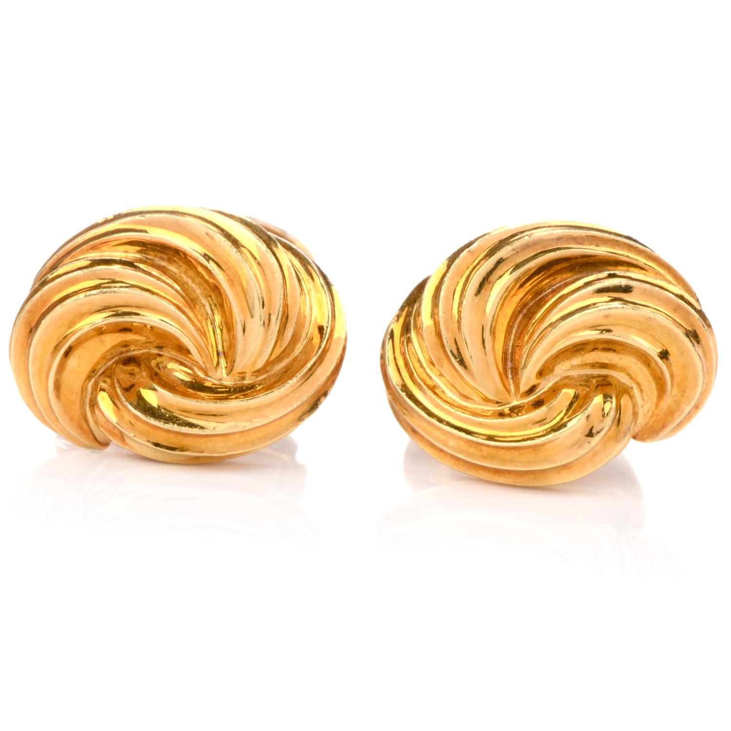 These classic and elegant Henry Dunay cufflinks are crafted in 18-karat yellow gold, weighing 18 grams and measuring 17mm wide x 13mm long. Designed as swirl motifs with rigid linear backings. Signed Henry Dunay and in excellent condition. 



This