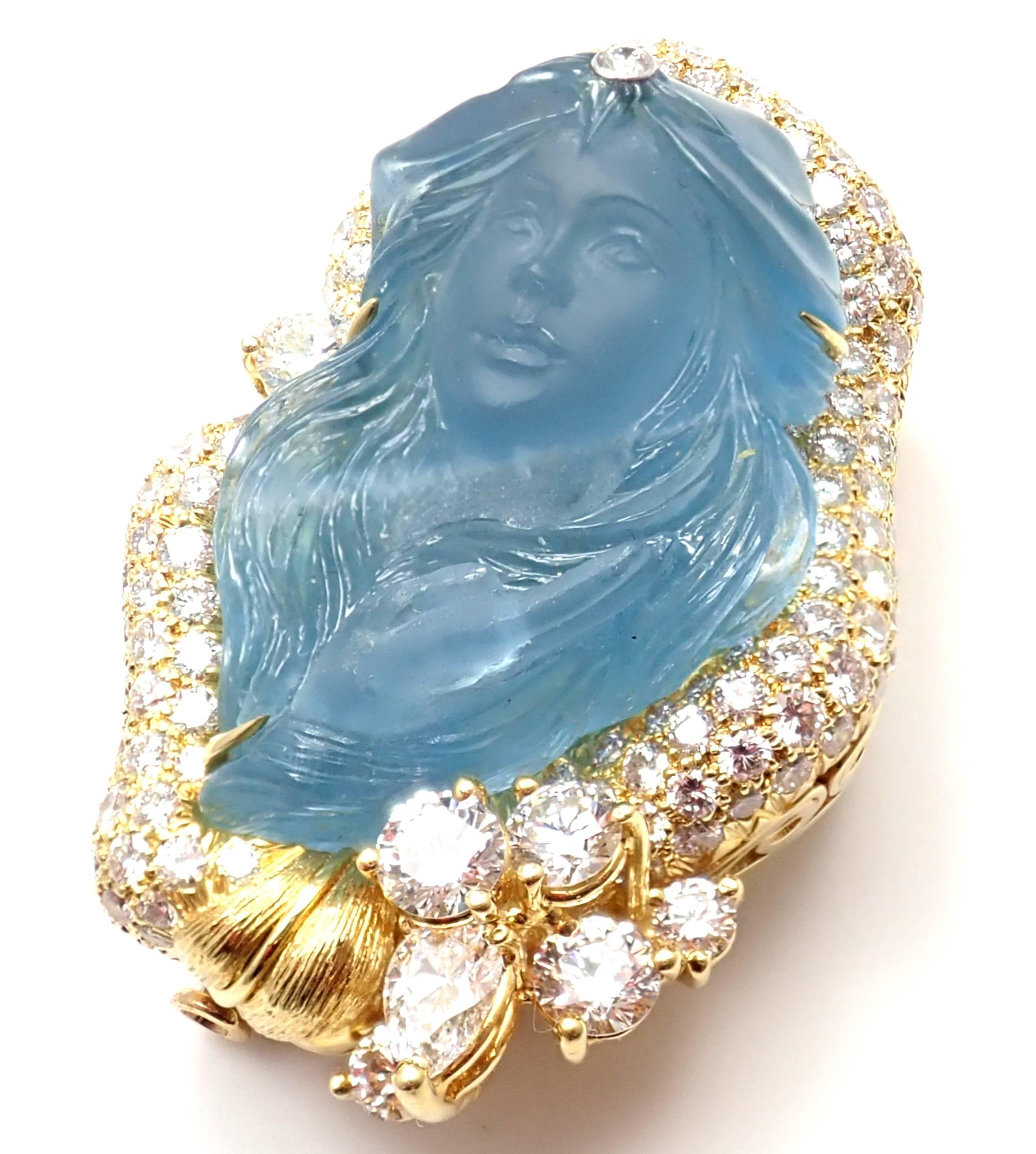 18k Yellow Gold Diamond Large Carved Aquamarine Pin Brooch By Henry Dunay. 
With 130 round brilliant cut diamonds VVS1 clarity G color total weight approx.7ct
1 carved aquamarine 34mm x 22mm approx. .30ct
Details:
Measurements: 44mm x 30mm
Weight: