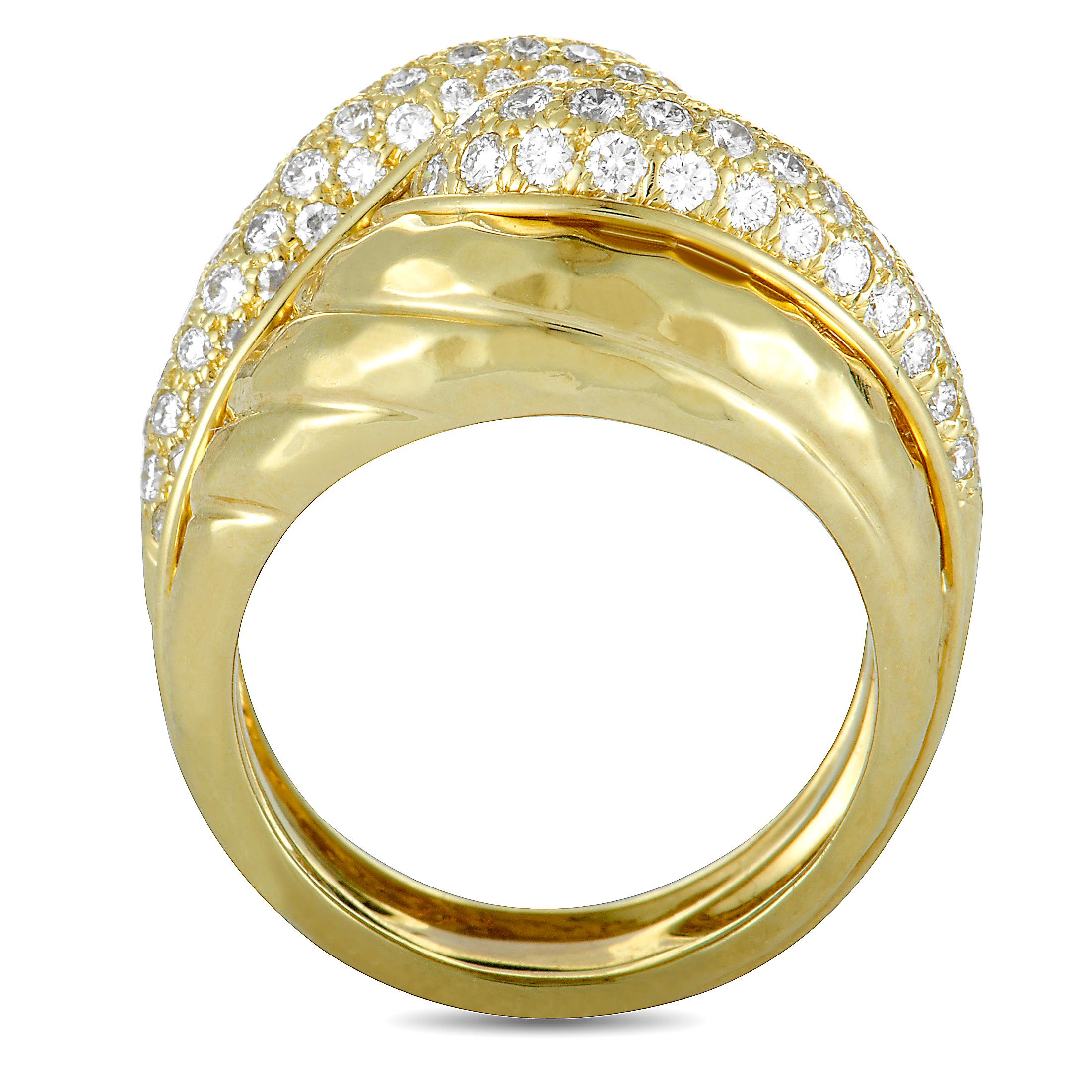 This Henry Dunay ring is made of 18K yellow gold and set with a total of 1.75 carats of diamonds that feature grade F color and VS1 clarity. The ring weighs 17.9 grams and boasts band thickness of 6 mm and top height of 8 mm, while top dimensions