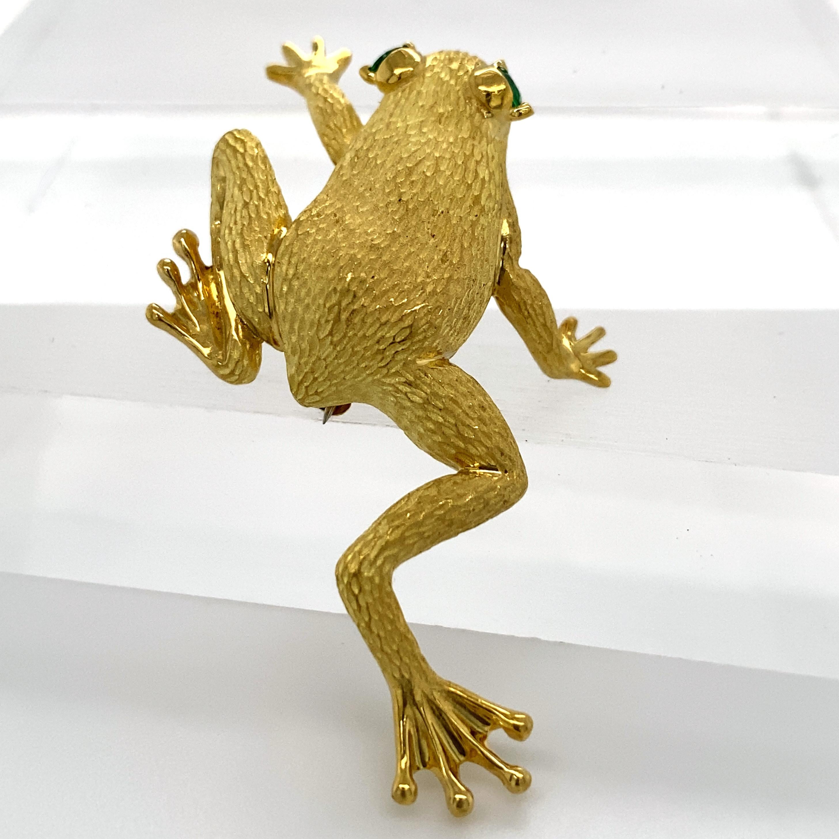 Heny Dunay designed naturalistic, yet luxurious and finely detailed jewelry for Neiman Marcus for years, and he had a few different frog designs.  This particular pin came in two different sizes -- ours is the smaller verfsion.  The surface work is