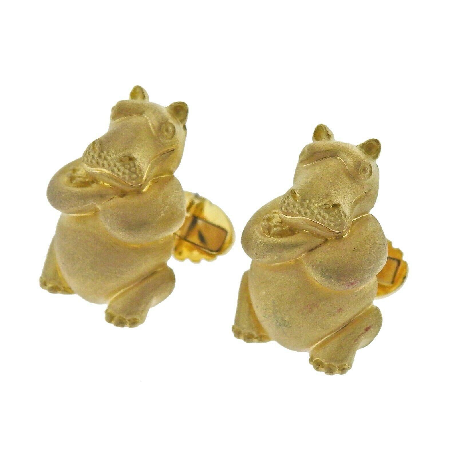 Pair of 18k yellow gold Hippo cufflinks by Henry Dunay. Cufflink top is 27mm x 20mm. Marked: D9018, Dunay 18k. Weight - 27.9 grams.
