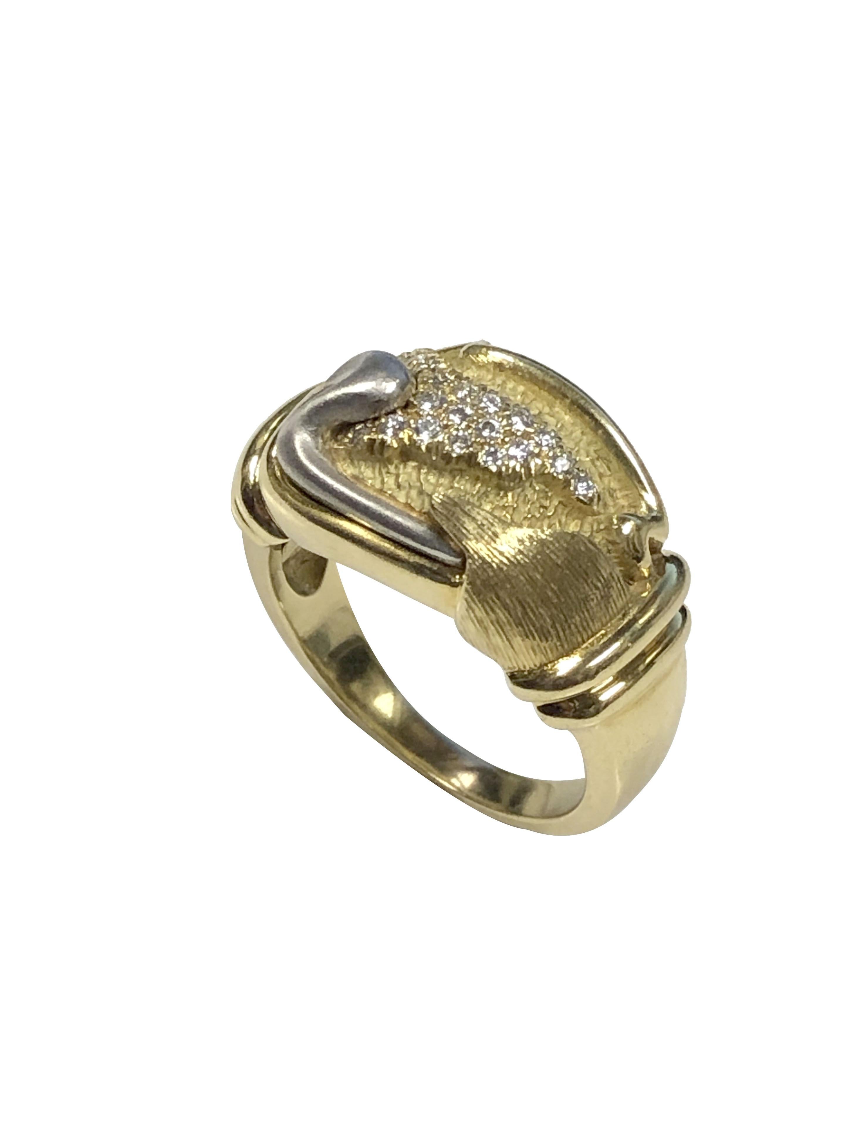 Circa 2000 Henry Dunay 18k Yellow Gold and Platinum Ring, having a free form flowing design the top of the ring measures 7/8 x 1/2 inch and weighs 11 Grams. Nice Sold construction with hand worked detailing and set with numerous Round Brilliant cut