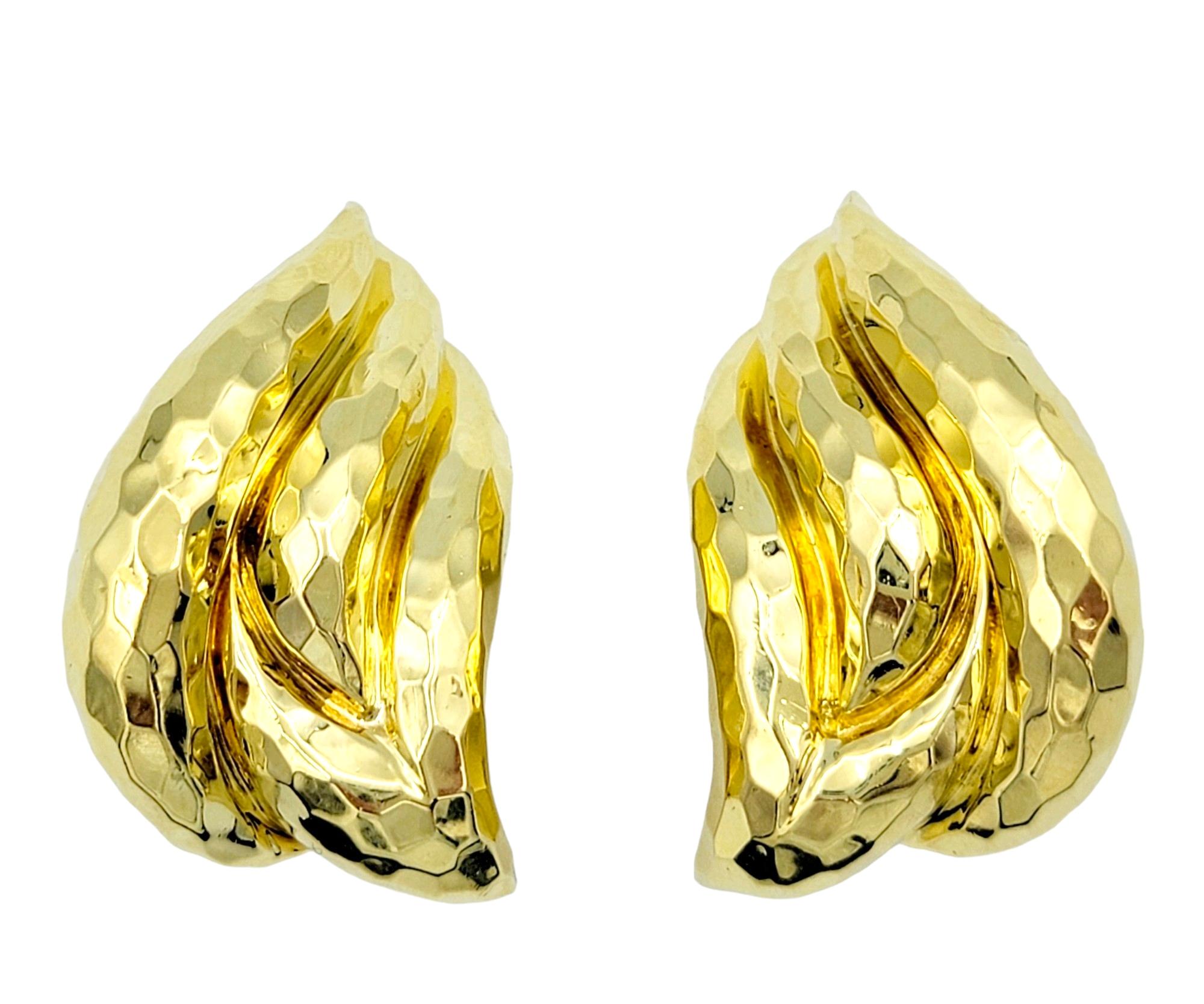 Contemporary Henry Dunay Hammered Finish Large Clip-on Earrings Set in 18 Karat Yellow Gold For Sale