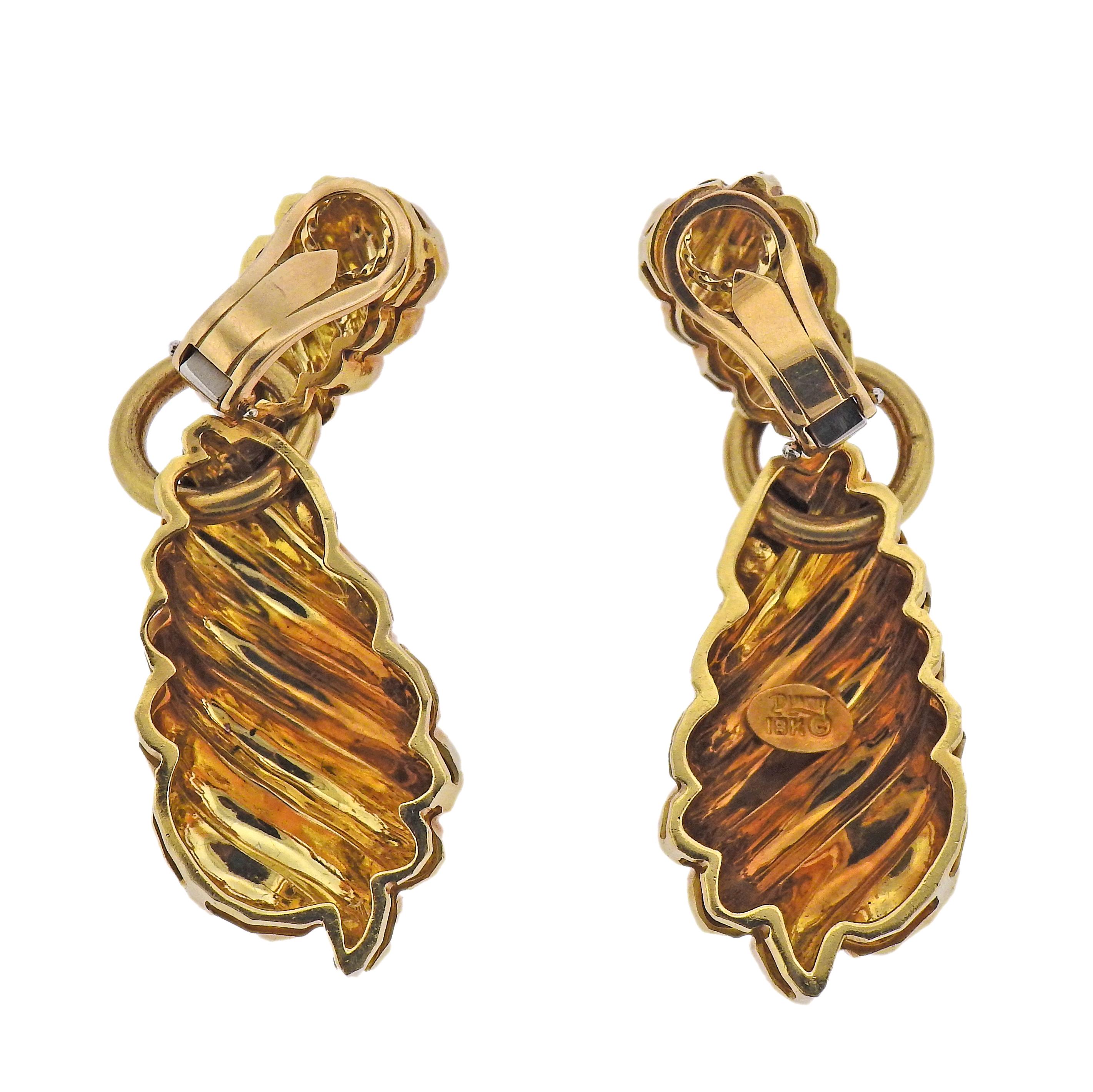 Pair of 18k yellow hammered gold drop earrings by Henry Dunay. Earrings measure 50mm x 20mm. Marked: 18k Dunay. Weight - 36.8 grams. 