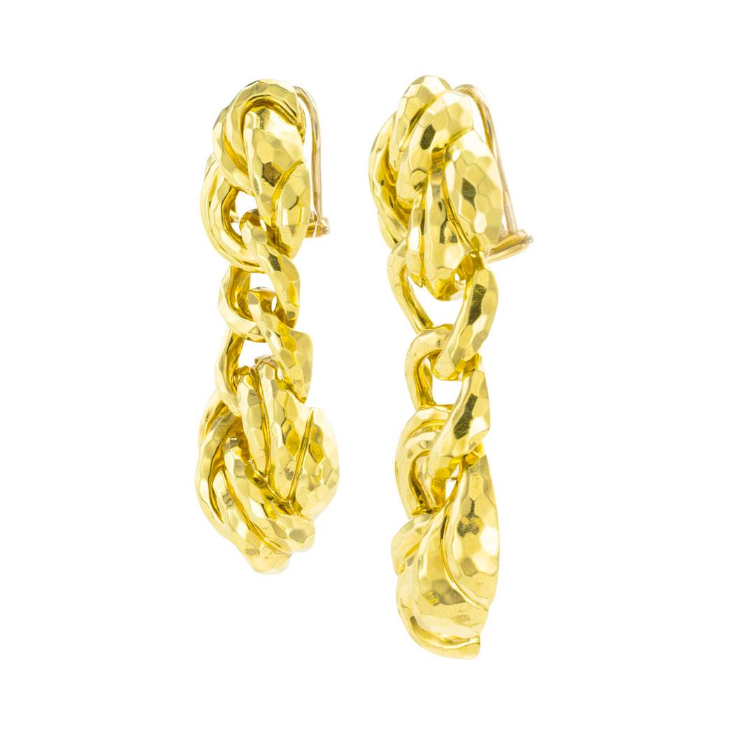 Henry Dunay long link hammered gold drop earrings circa 1990.  *

ABOUT THIS ITEM:  #E-DJ924B. Scroll down for specifications.  Featuring that famous Dunay hammered gold finish that makes the gold sparkle like a faceted gem.  These are statement