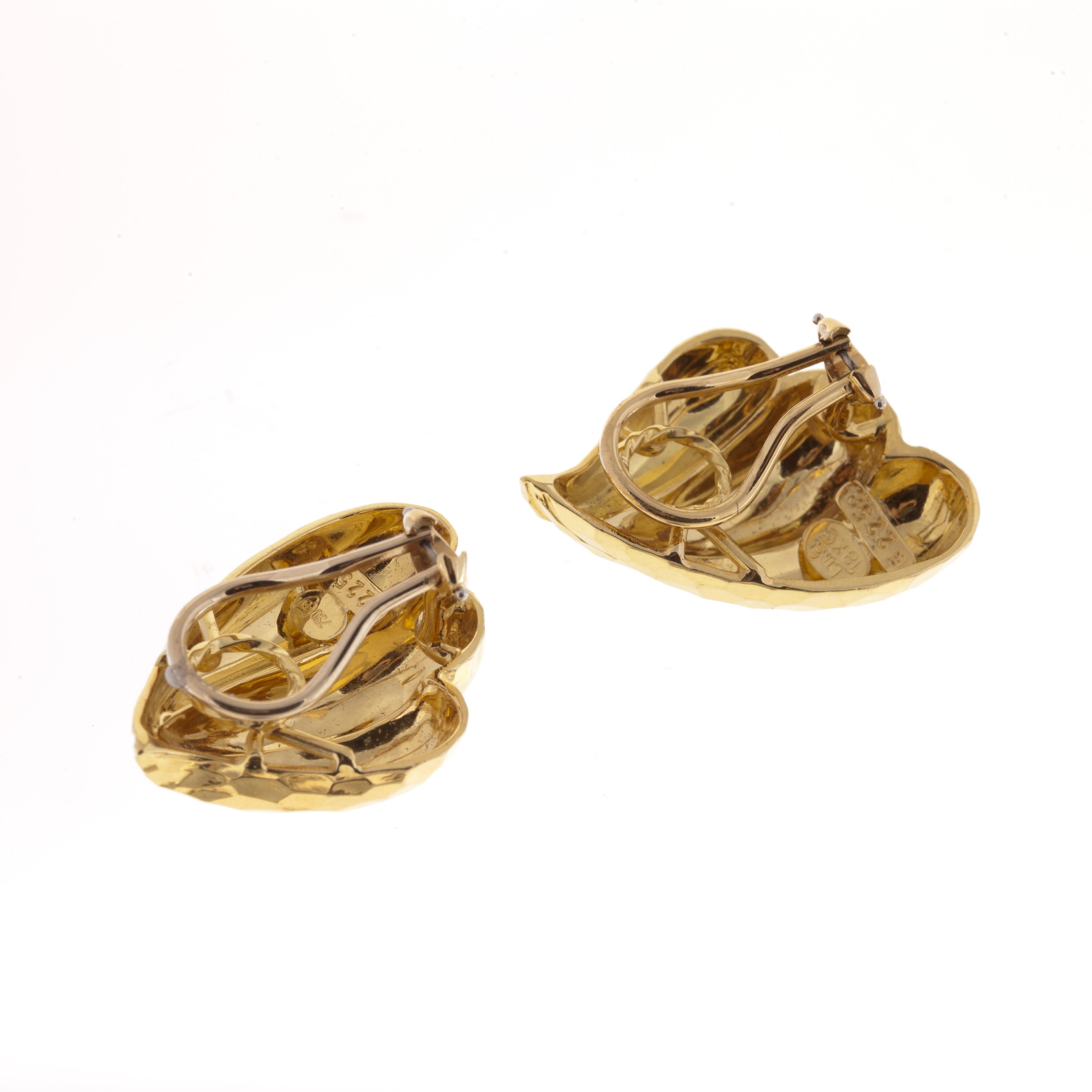 Henry Dunay earrings in 18K yellow hammered gold.  They are marked on the inside 