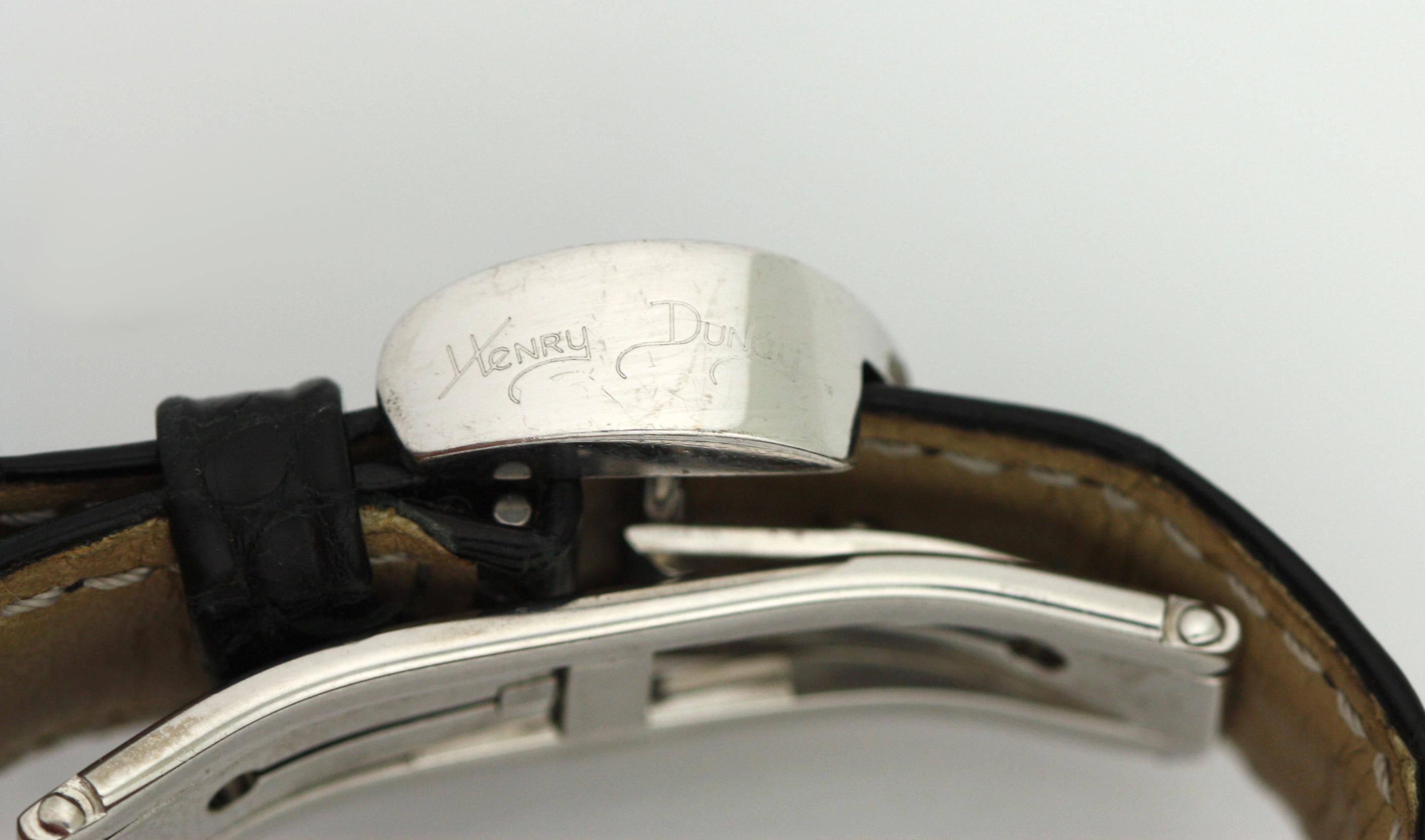 
Henry Dunay Ladies’ 18K White Gold Diamond-Set Wristwatch
quartz movement, pave diamond-set dial, case back secured by 4 screws, case and movement signed, diameter 20 mm, length 12 inches (adjustable)with an 18k white gold Henry Dunay folding