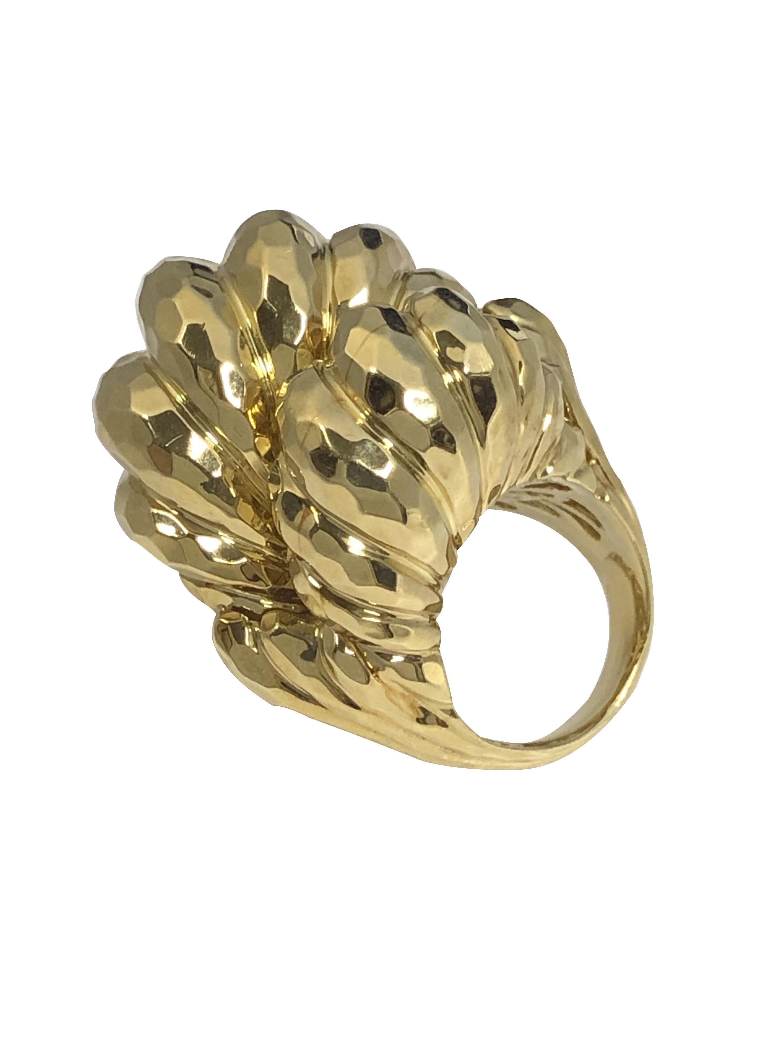 Circa 2000 Henry Dunay 18k Yellow Gold ring, a large and impressive ring, the top measuring 1 1/4 X 1 1/2 inches and weighing 46.9 Grams, Solid construction and having a hand hammered finish.finger size 5 and is sizable. Excellent, near unworn