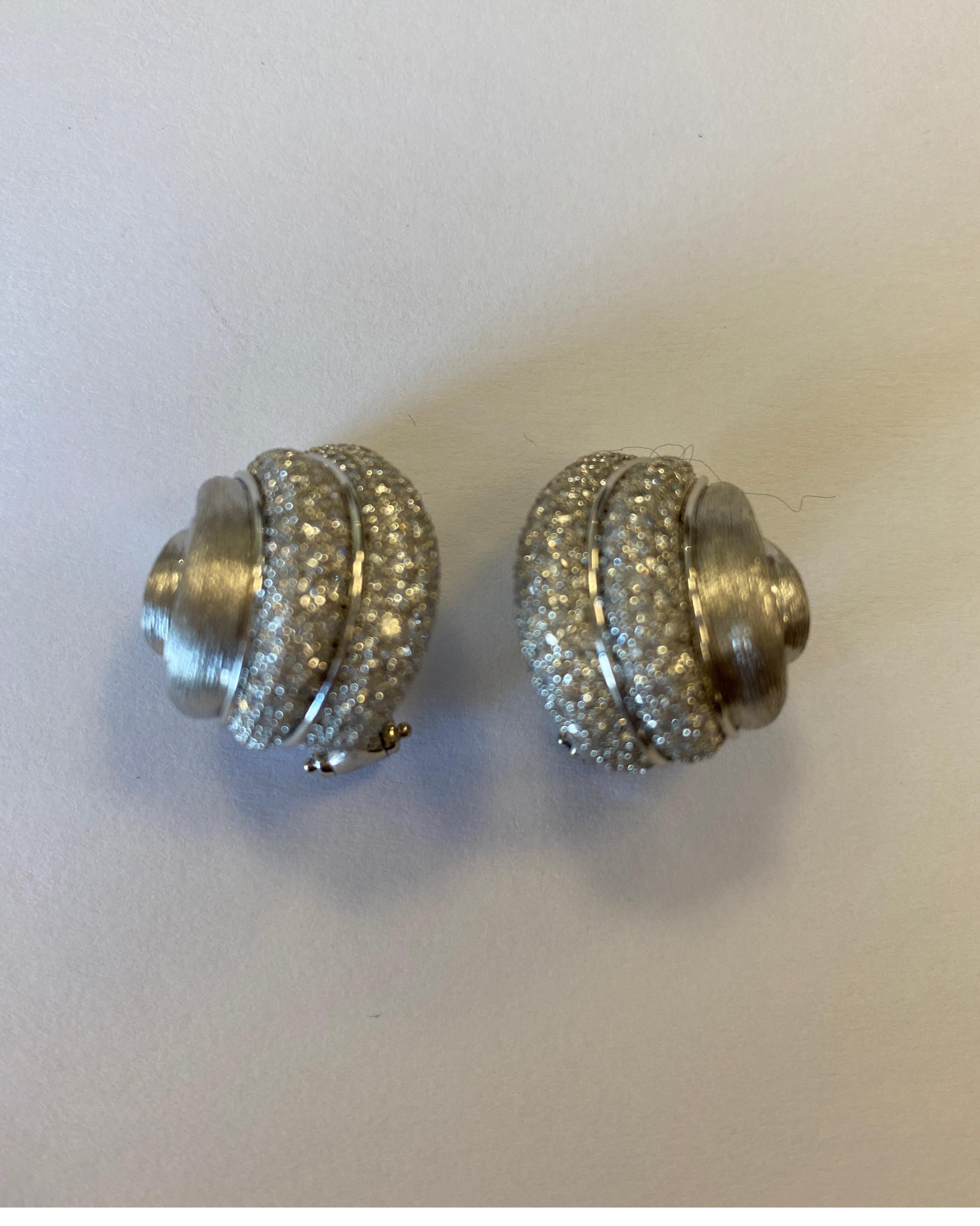 Henry Dunay, platinum ear clips, Sabi finish, set with 236 full cut round diamonds weighing 3.90cts total.
Brand new, never worn
Last retail $34,500