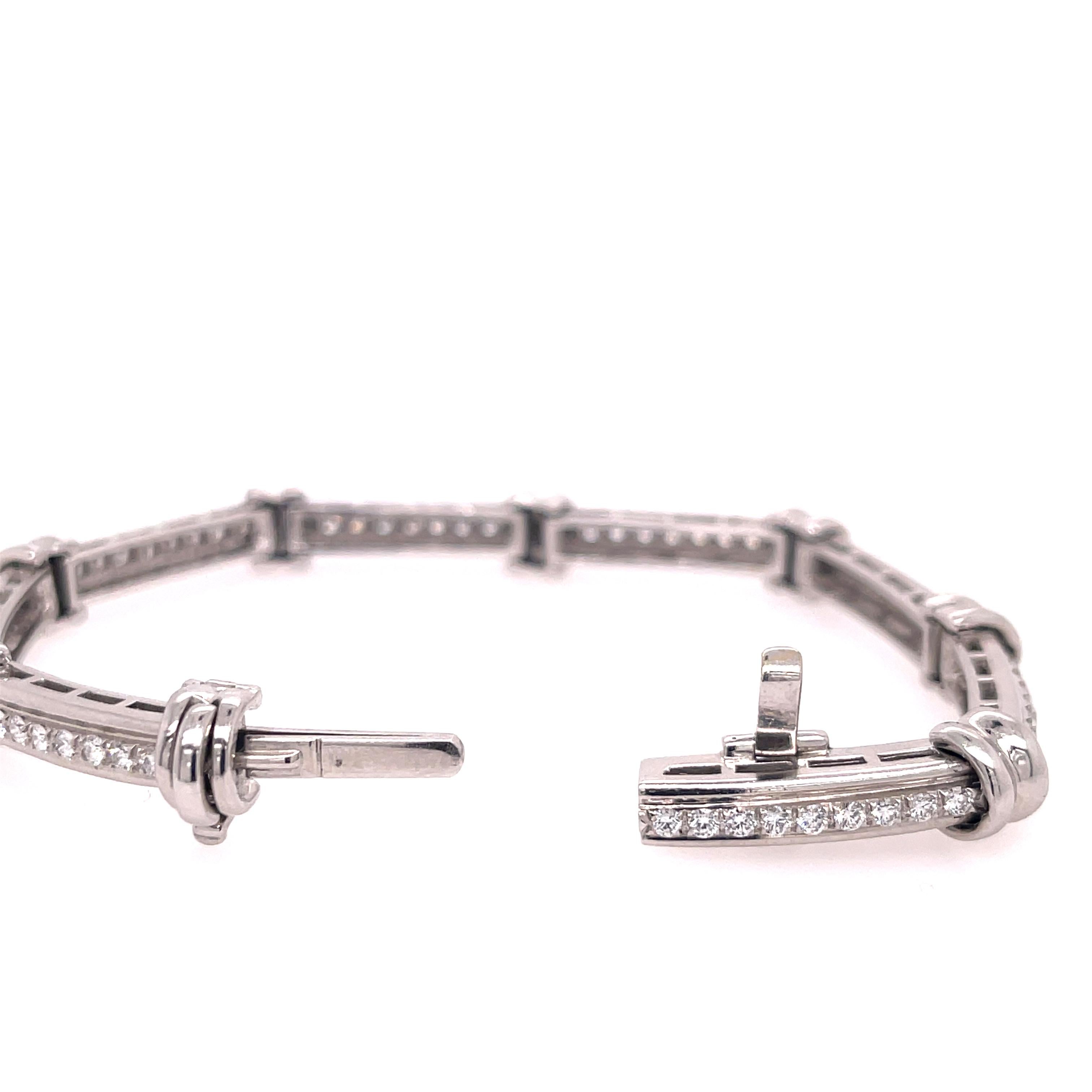 Henry Dunay Diamond Bracelet in Platinum. The bracelet features 1.80ctw of brilliant round diamonds. Signed Dunay 950PT D2129. 
6 5/8 inches long
34 Grams
