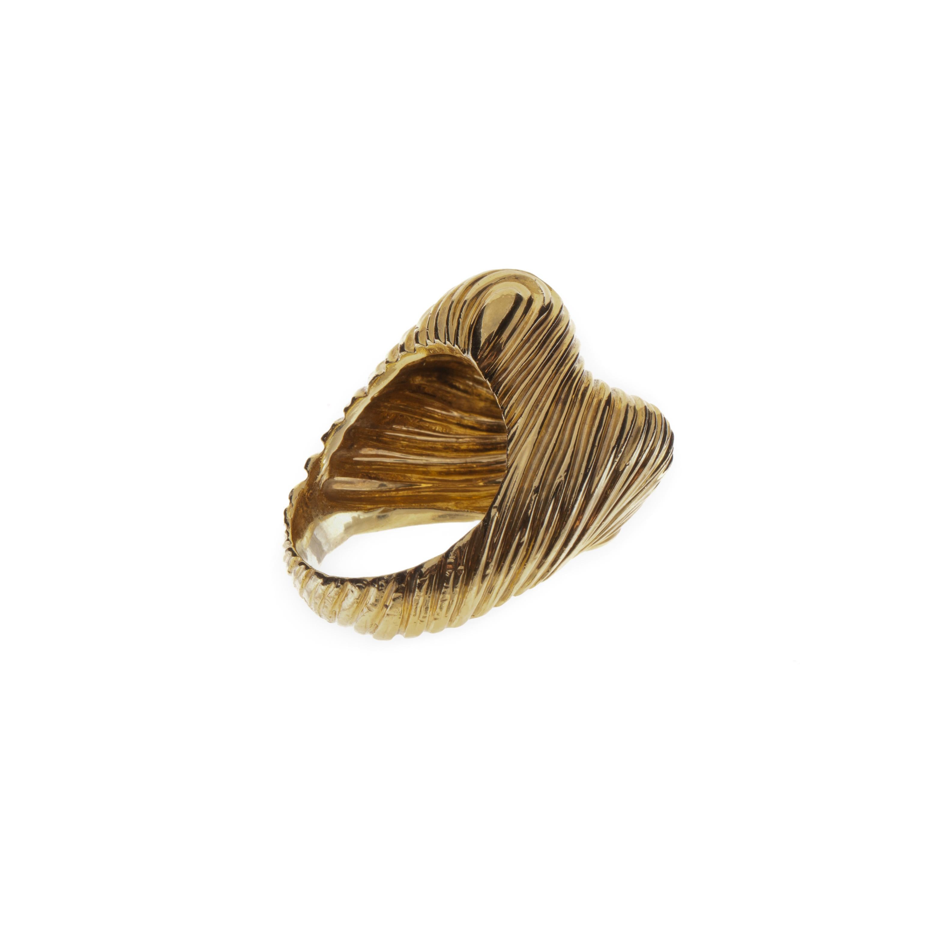 Henry Dunay ring in 18K yellow gold with a ribbed dome design.  Presentation area is 7/8 inch by 7/8 inch and it stands 5/8 inch off the finger.  The ring is a size 5 1/2.