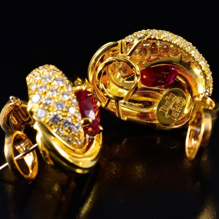 Oval Cut Henry Dunay Ruby and Diamond 18 Karat Gold Knot Earrings, 1980s For Sale