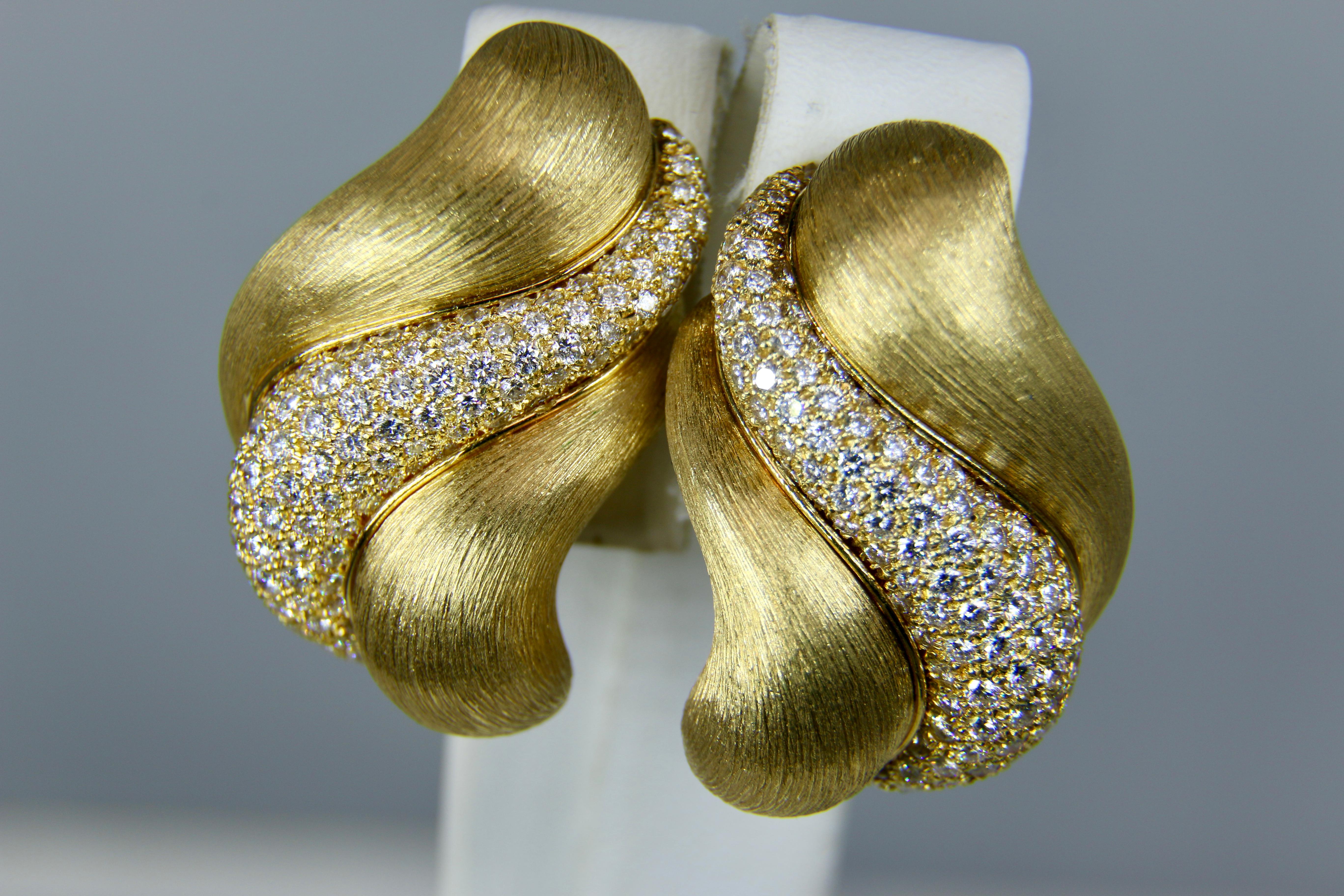 Gold and Diamond Sabi Earrings from Henry Dunay.  These Clip On Earrings have just the right style for the jewelry lover. 
