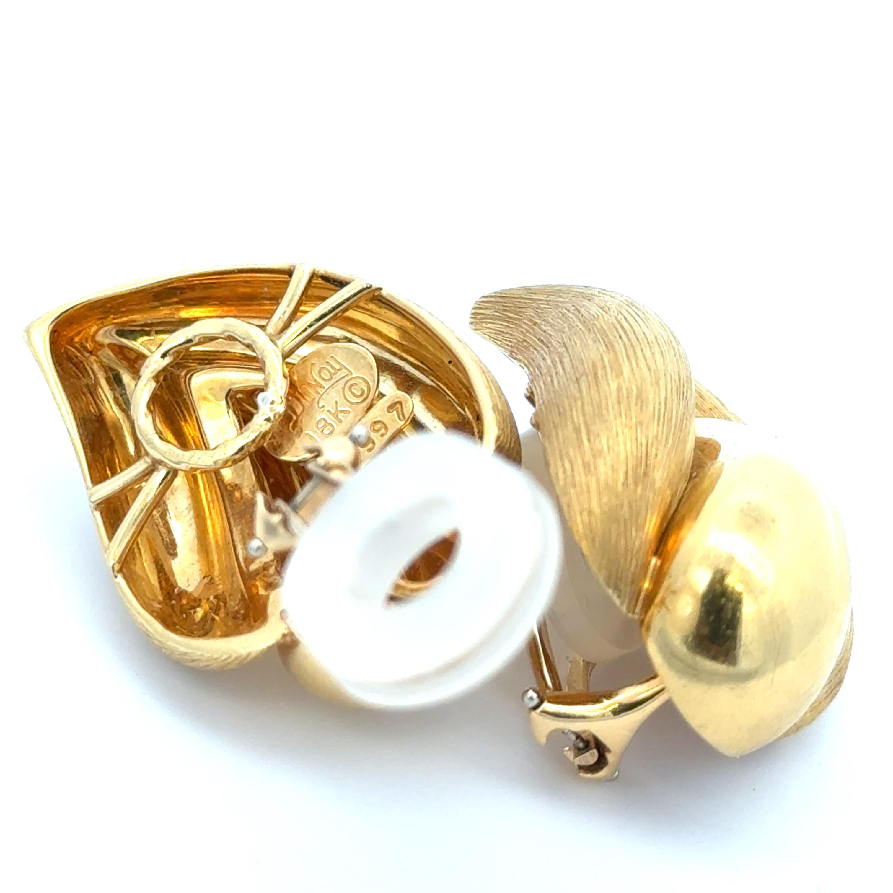 Henry Dunay Sabi Gold Flame Earrings in 18K Yellow Gold. The earrings have omega backs, approximately measure 1.25 x 7/8 inches, and weigh 29.5 grams.