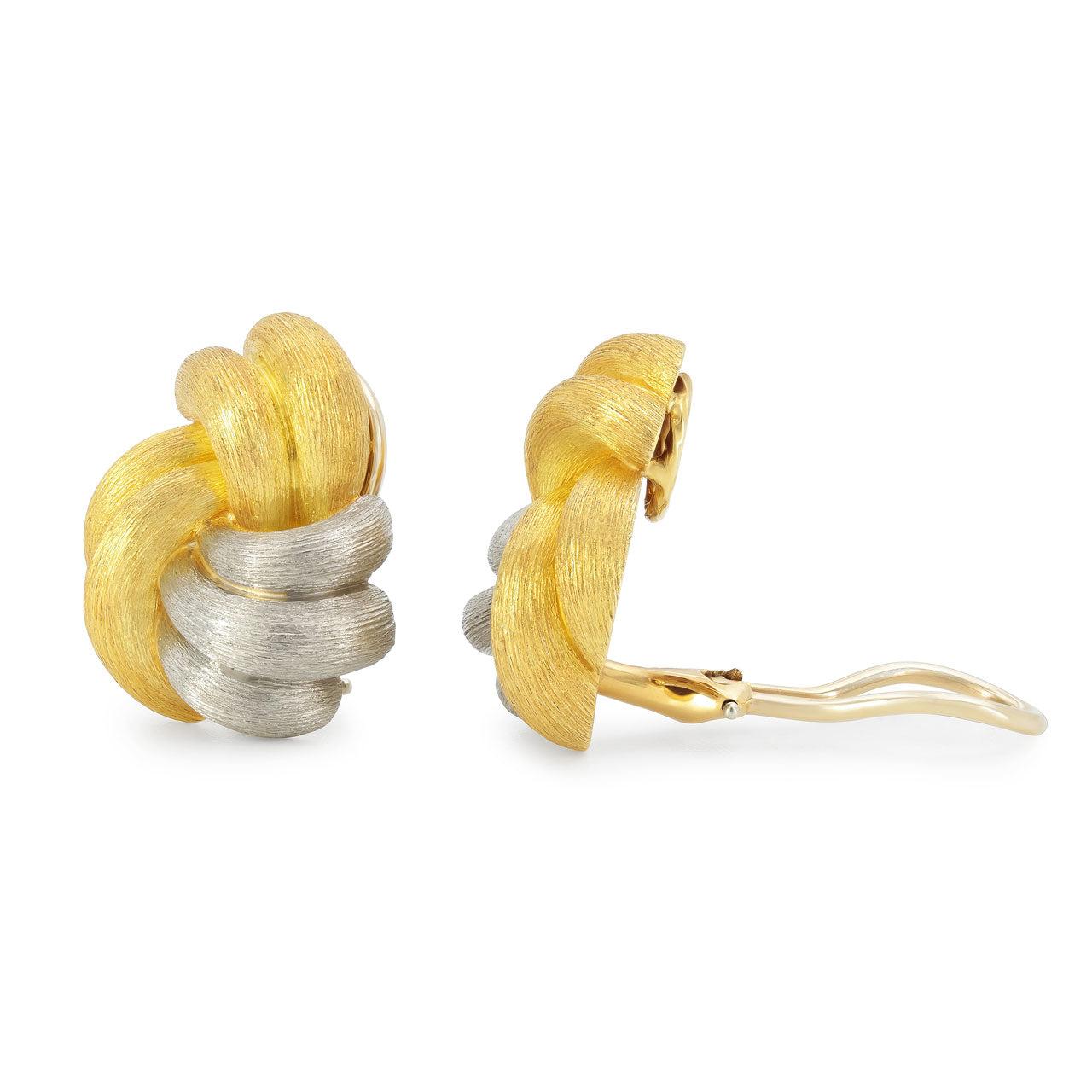 Henry Dunay Knot 'Sabi' Earrings in 18K Gold and Platinum
The knot motif earrings in textured 'Sabi' finish, in 18K yellow gold and platinum. Signed Dunay for Henry Dunay, with omega backs.
Condition: Pre-owned
Designer: Henry Dunay
Metal: 18K