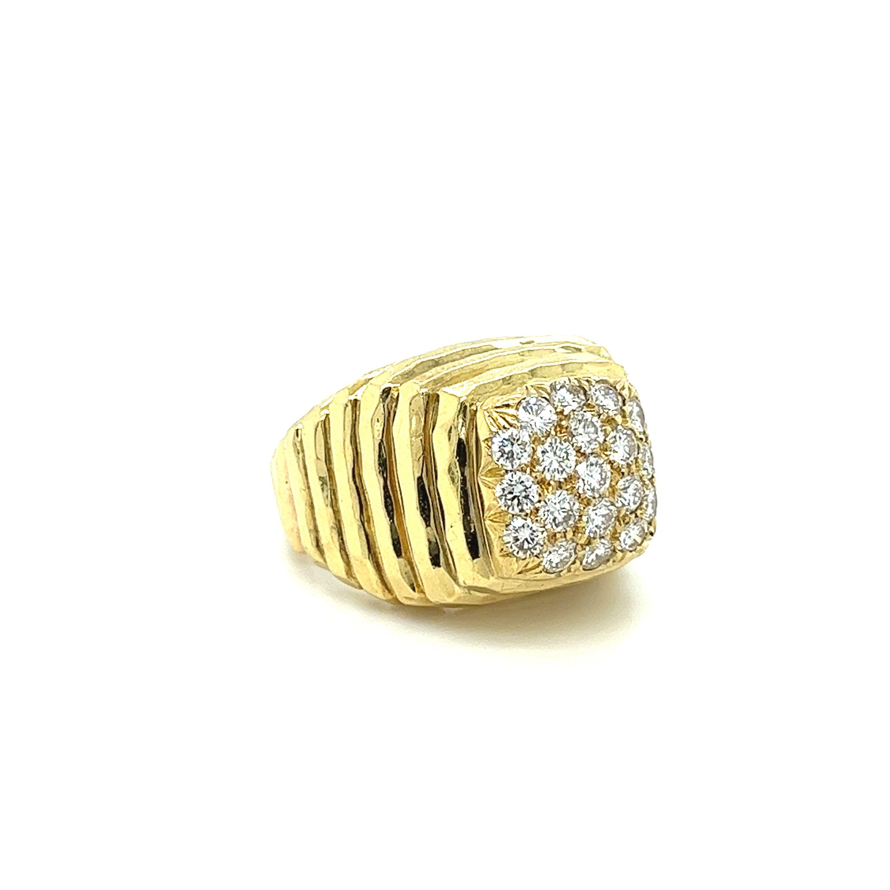 Henry Dunay signed elevated 19 piece diamond cluster ring, set in 18-karat textured ribbed solid yellow gold. 

Details: 
✔ Metal: 18K Yellow Gold
✔ Size: 8 
✔ Weight: 17.3 Grams

Stone Details:
✔ Stone Count: 19 Pieces 
✔ Carat: 1.20 (total)
✔ Cut: