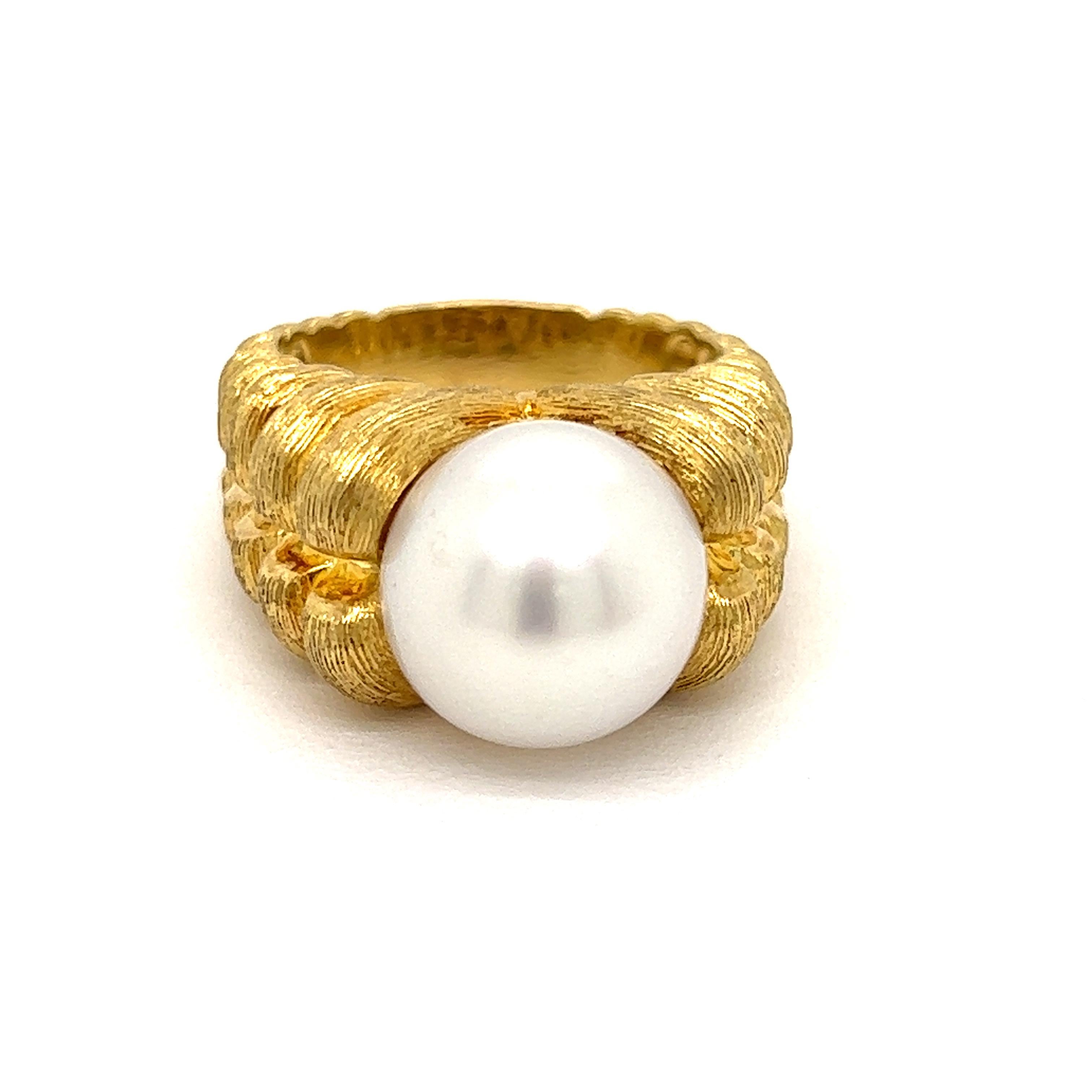 Bold. Stunning. Classic.  This Henry Dunay south sea pearl ring is a stunner.  With approximately ten grams of  18K yellow gold expertly crafted with the designers fine scratched surface technique known as Sabi.  The beautiful clean cultivated white