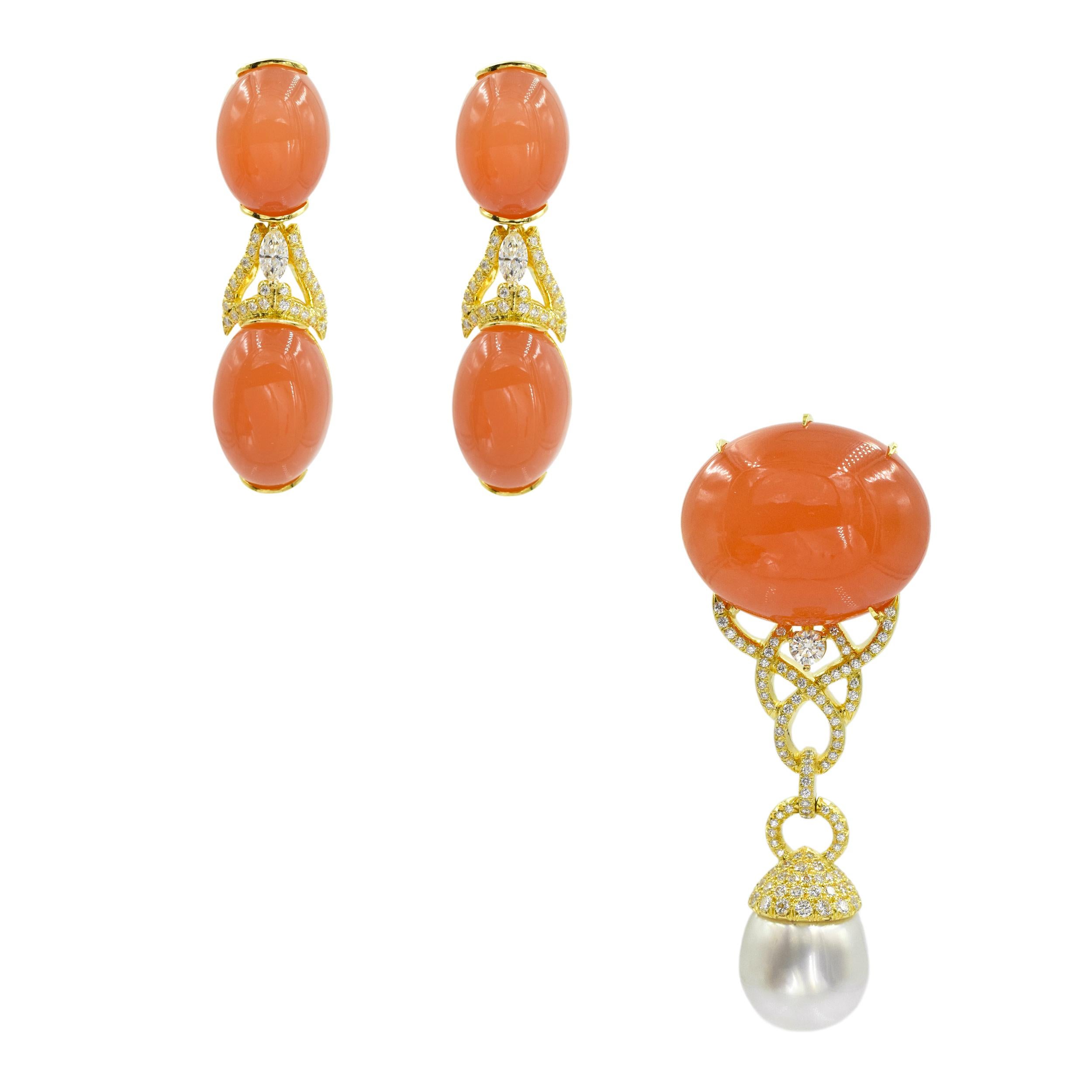 Tangerine moonstone, diamond, cultured pearl and 18k yellow gold brooch and drop earrings set by Henry Dunay.

Brooch crafted in 18k yellow gold, and pave set with 1.70ct. round brilliant cut diamonds, featuring horizontally set oval cabochon cut
