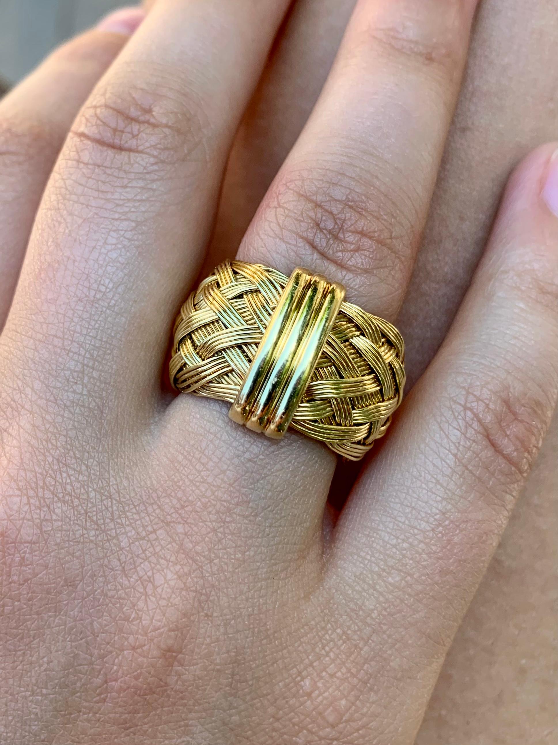 Beautiful estate Henry Dunay Woven 18K gold wide band ring. 
Fine hand craftsmanship, lovely substantial texture. 
This ring can be worn as a classic finger ring and as a pendant.

Highly admired American jeweler- Henry Dunay pieces have attracted
