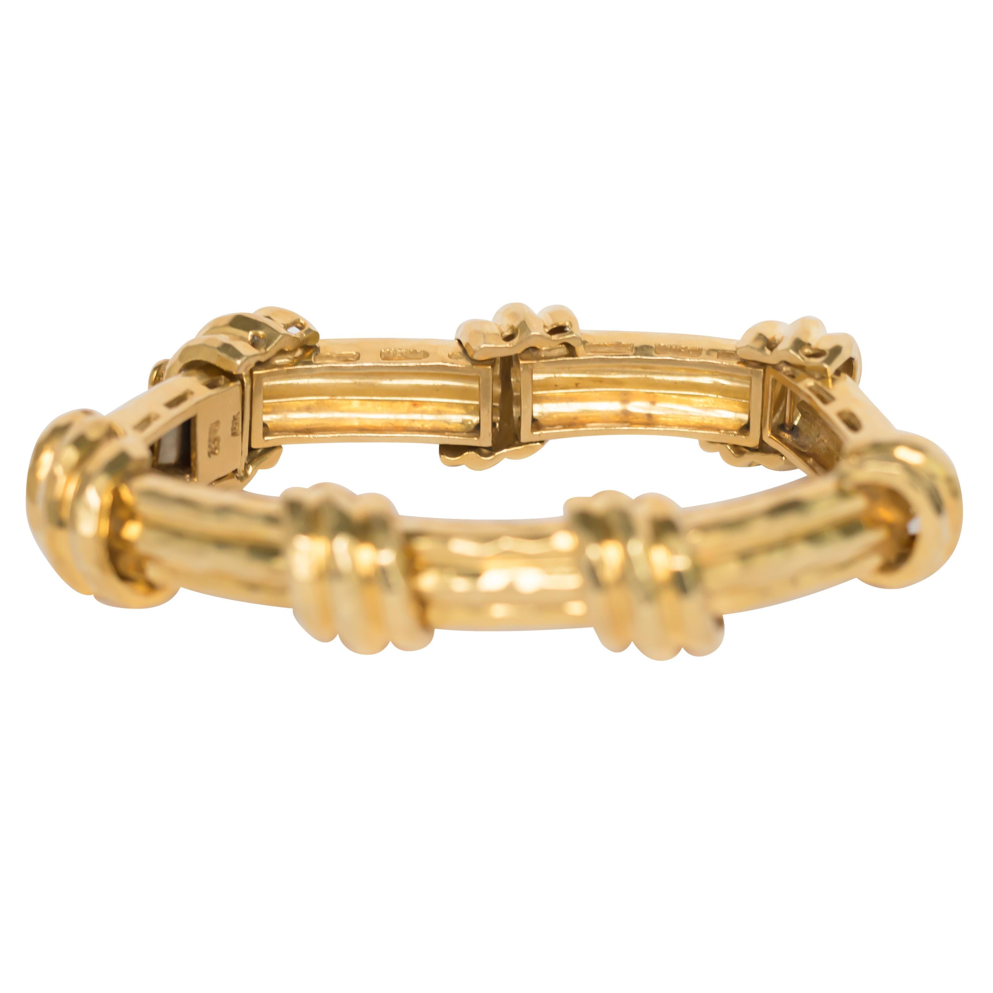 Length: 7.50 inches 
Metal Type: 18 karat Yellow Gold 
Weight: 76.4 grams

Finger to Top of Stone Measurement: 8.00mm