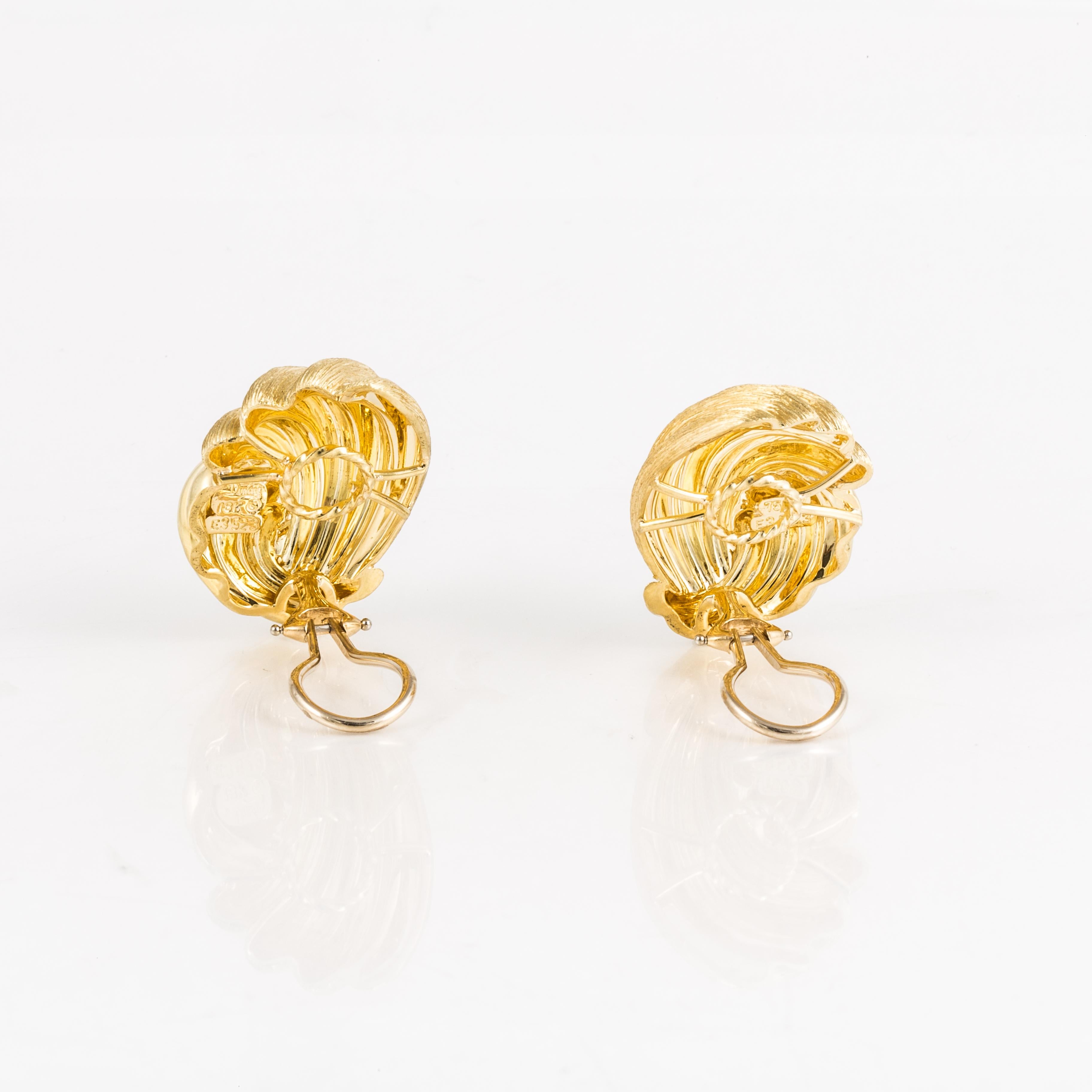 Henry Dunay earrings in 18K yellow gold with the Sabi finish and a high polish finish.  They are marked 