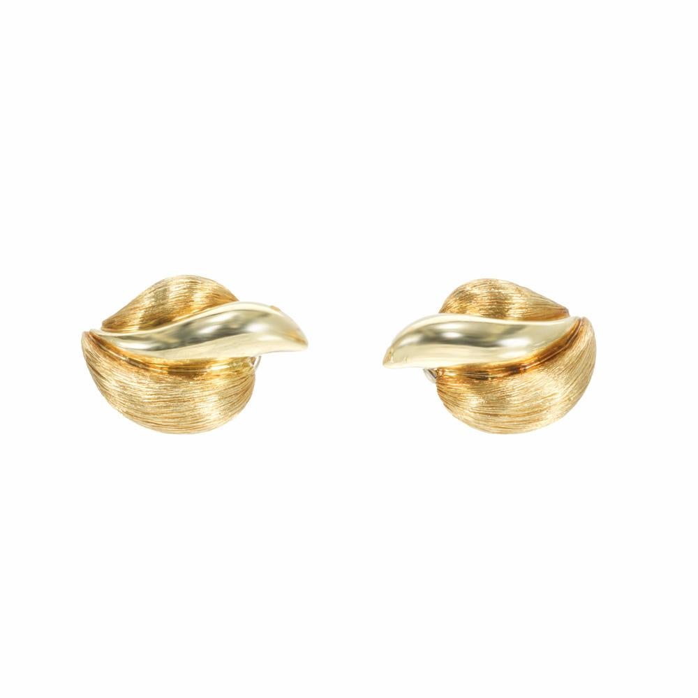 Henry Dunay 18k yellow gold flame leaf earrings. Henry Dunay is a world's premier jewelry designers, known for his famous Sabi textured styling which is a result of finely hand-etched lines that require precision and skill. 

18k yellow