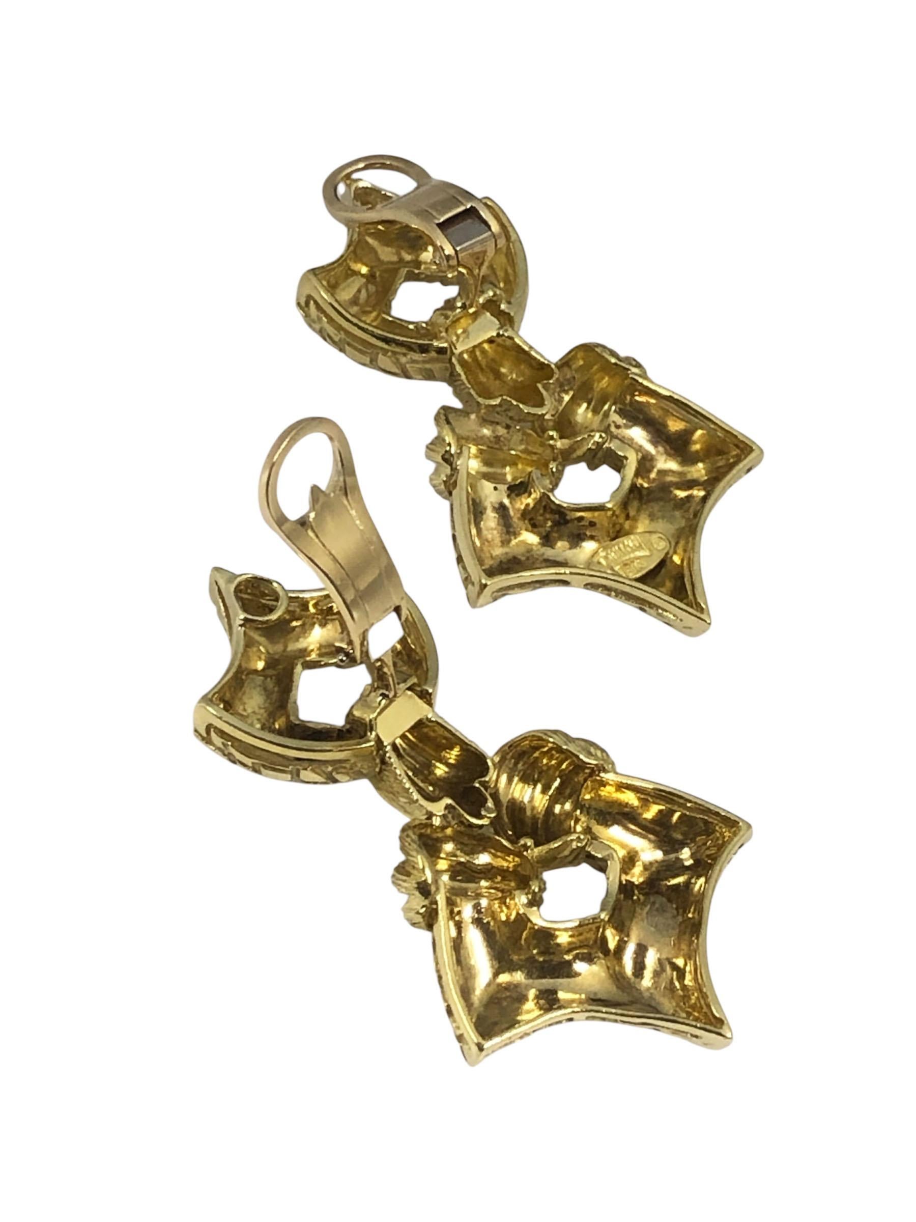 Circa 2000 Henry Dunay statement large 18k Yellow Gold Door Knocker Earrings,  measuring 2 1/8 inches in length and 1 1/8 inch at the widest portion. The bottom and top sections are hinged for separate movement. having different texturing design