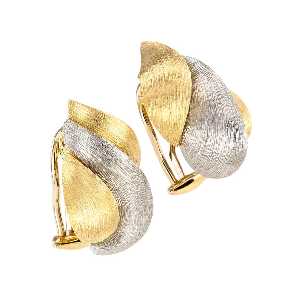 Henry Dunay yellow gold and platinum Sabi finish clip earrings circa 1990. Love them because they caught your eye, and we are here to connect you with beautiful and affordable jewelry.  It is time to claim a reward Yourself!  Simple and concise