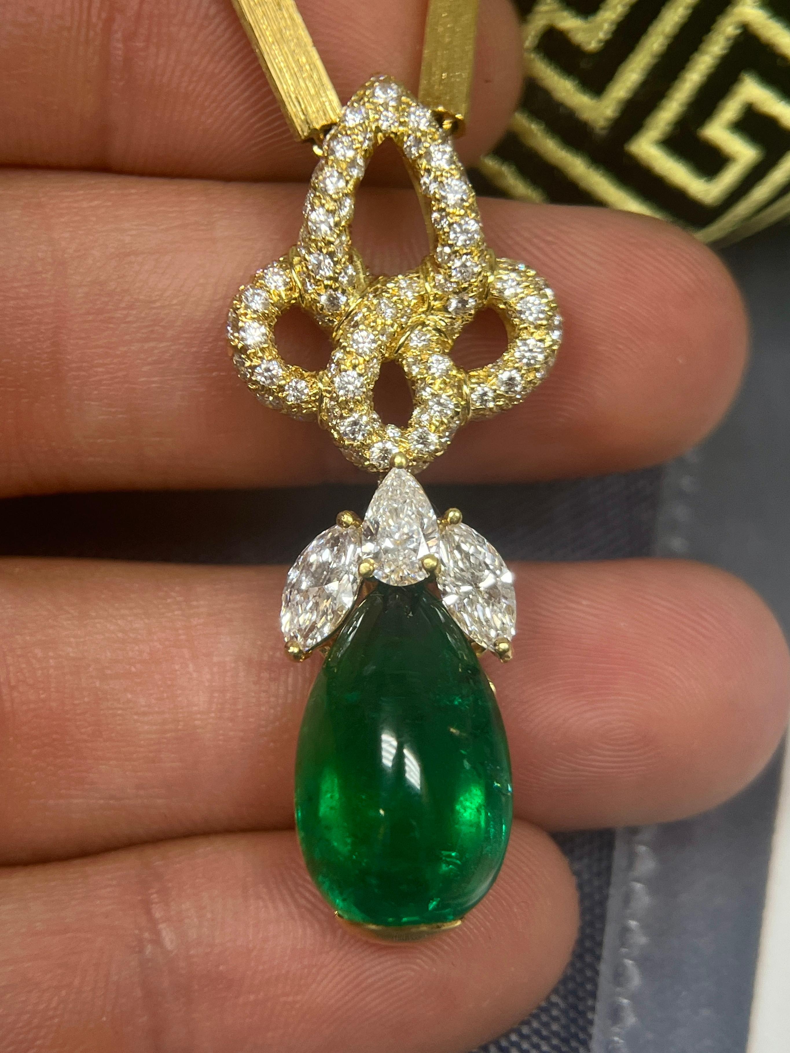 Henry Dunay signed natural cabochon cut emerald and mixed cut diamond pendant necklace. Set in 18k solid yellow gold, with a fancy link chain and lobster clip closure. Certified by GIA and AGL. Two certificates from the most well-respected
