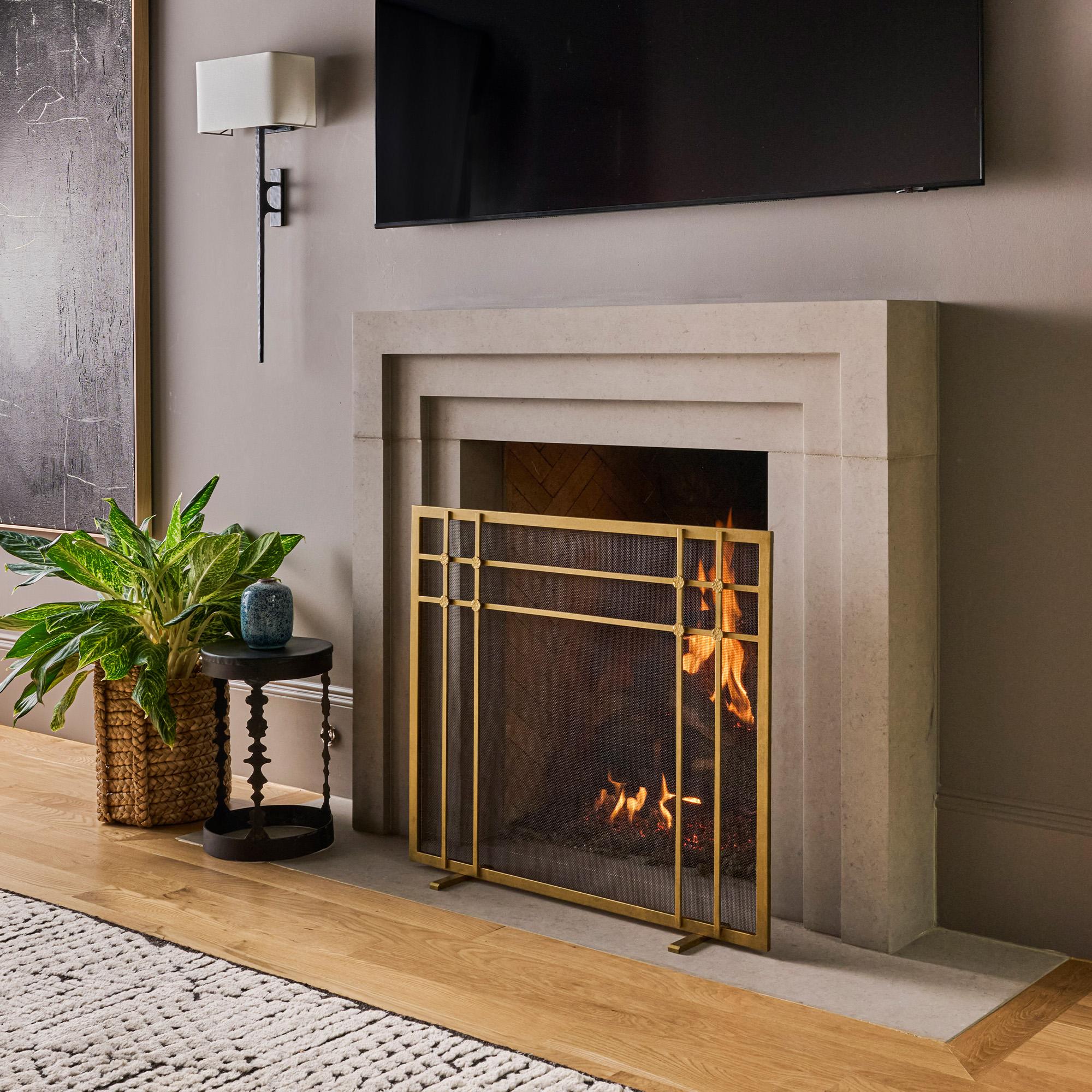 Pantalla de chimenea Henry en negro dorado Hierro en venta