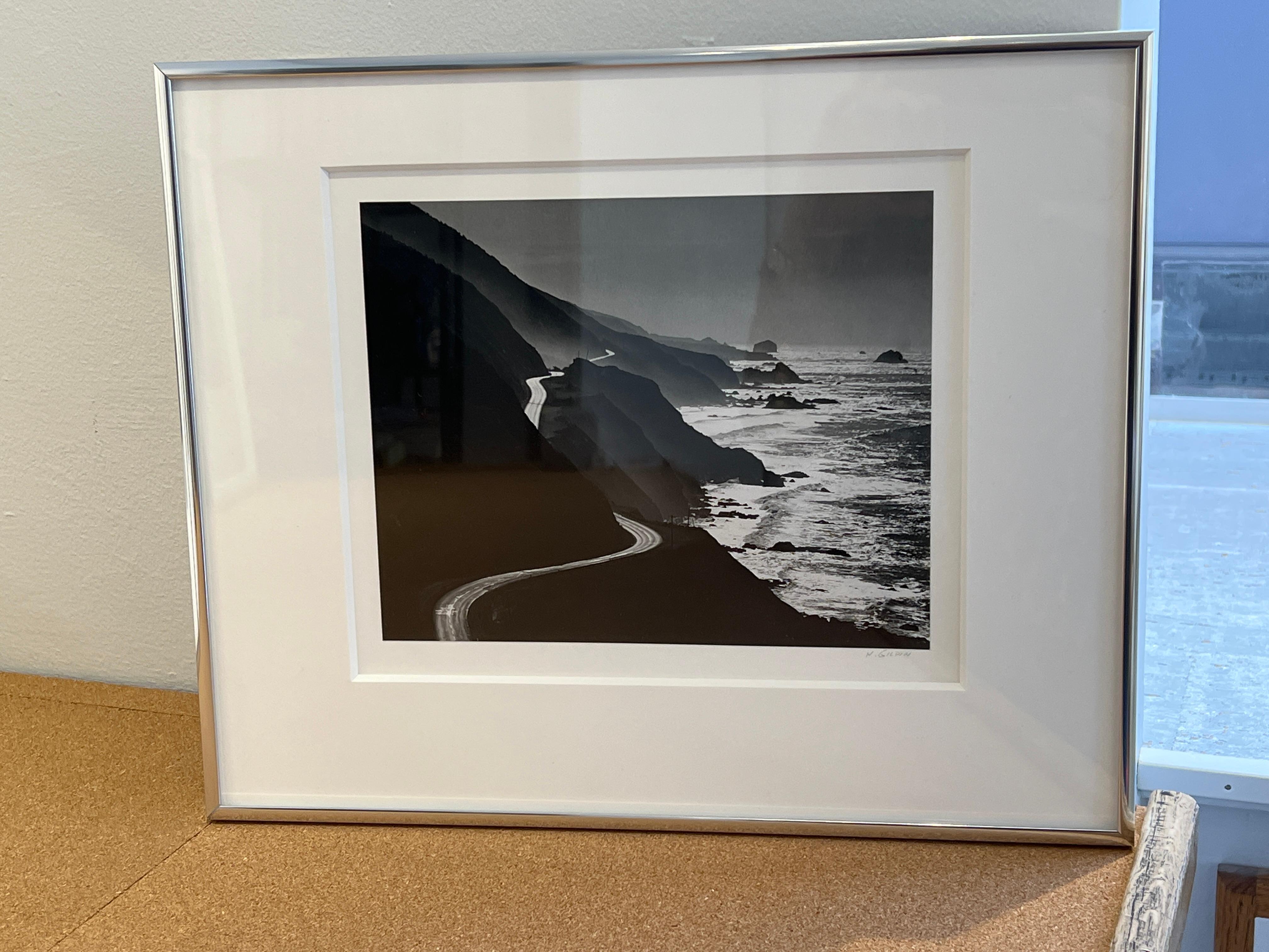 Signed on the front of the mount in ink. Original gelatin silver print by Henry Gilpin. Mounted and framed.