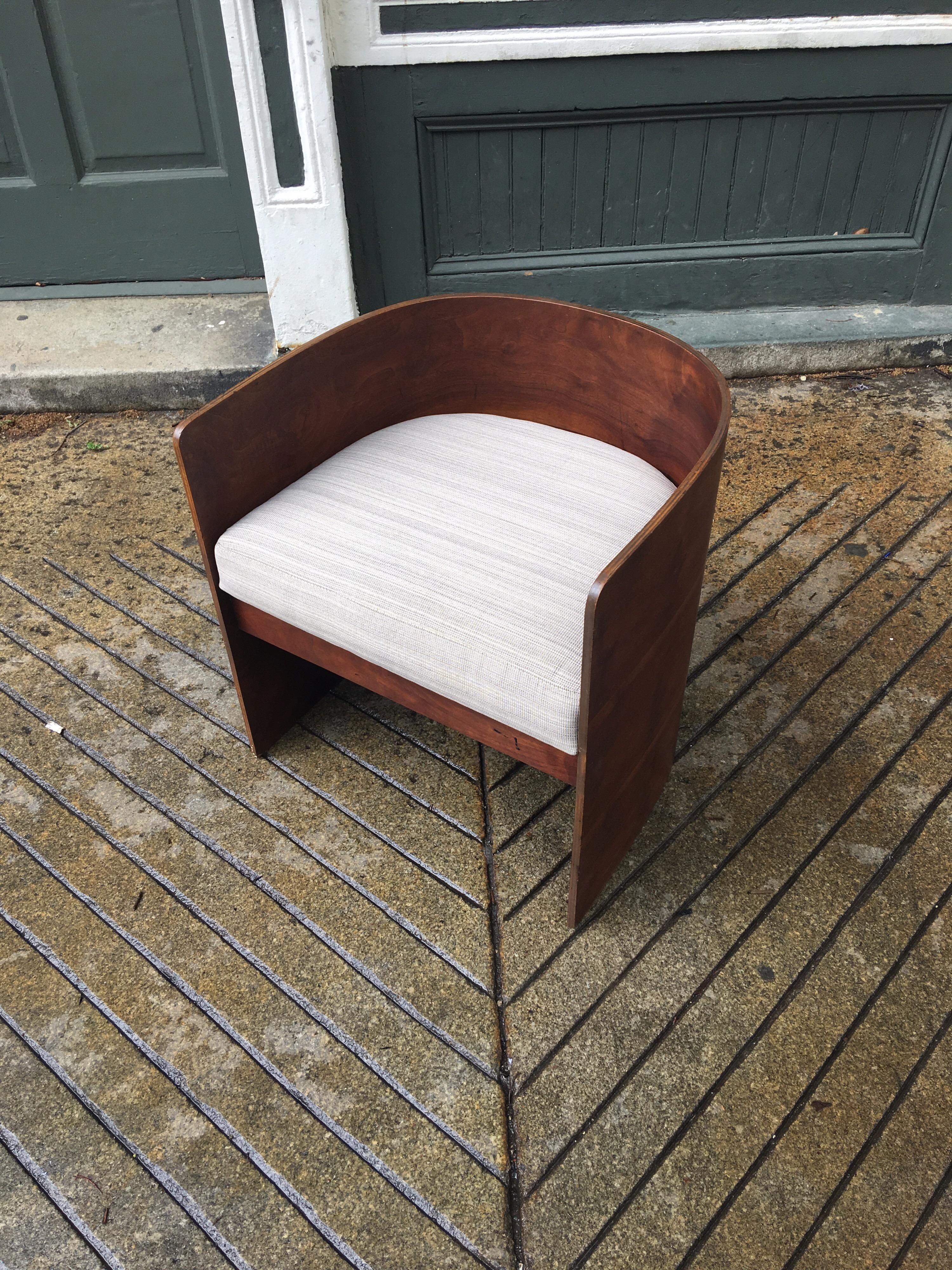 Nice Molded plywood tub chair with walnut outer shell in the style of Henry Glass. Newly upholstered seat cushion, chair is ready to go!