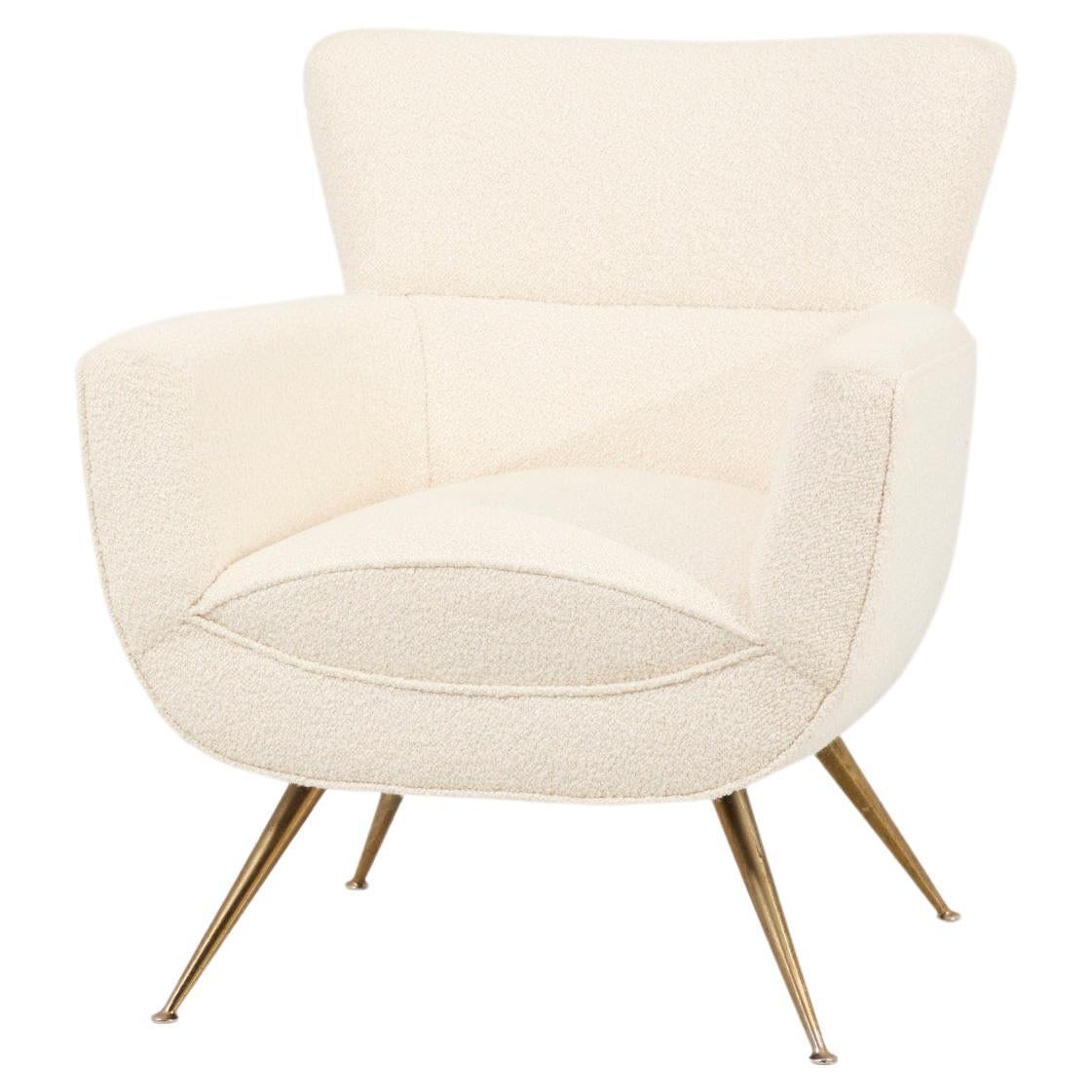 Henry glass lounge chair in Dedar Bouclé US 1950s
New upholstered and solid brass legs.