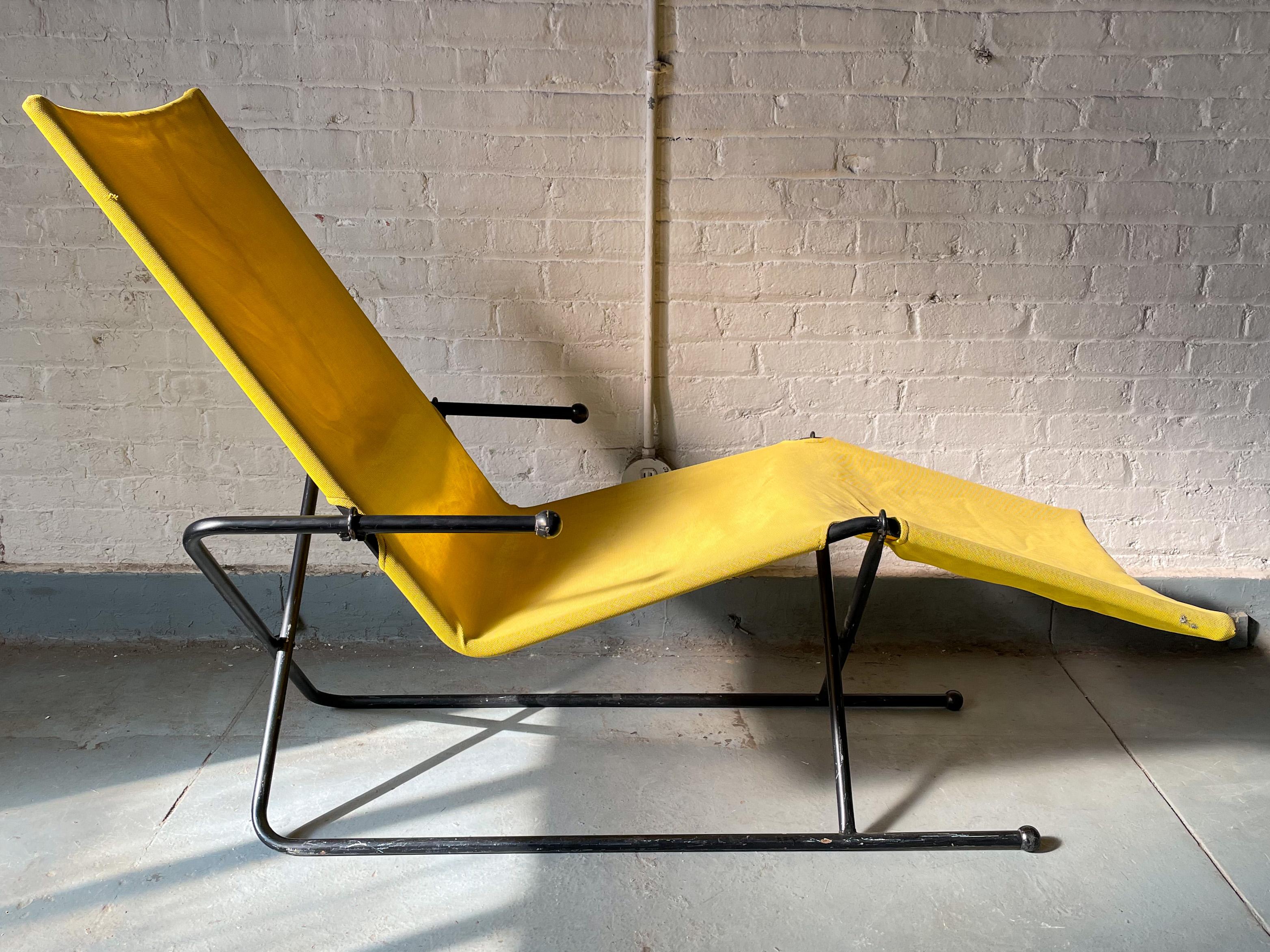 Chaise of tubular steel with plastic end caps and its original mesh sling. By Austrian/American designer Henry Glass, 1960’s. Prototype from his Sling-Line series of mobile and space-saving folding furniture. Glass worked with Gilbert Rohde in New