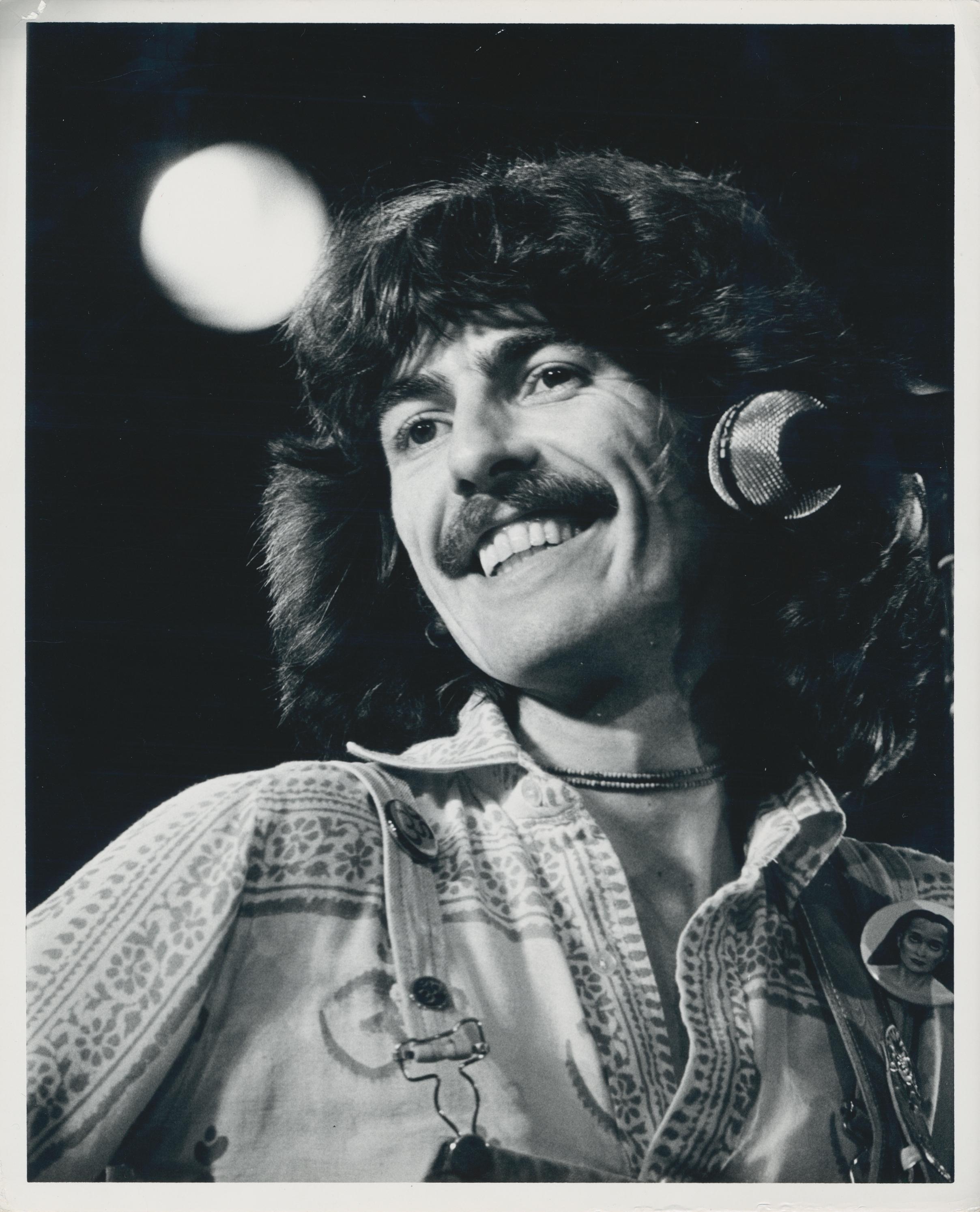 Henry Grossman Portrait Photograph - George Harrison on Stage, Black and White Photography, 25, 3 x 20, 6 cm